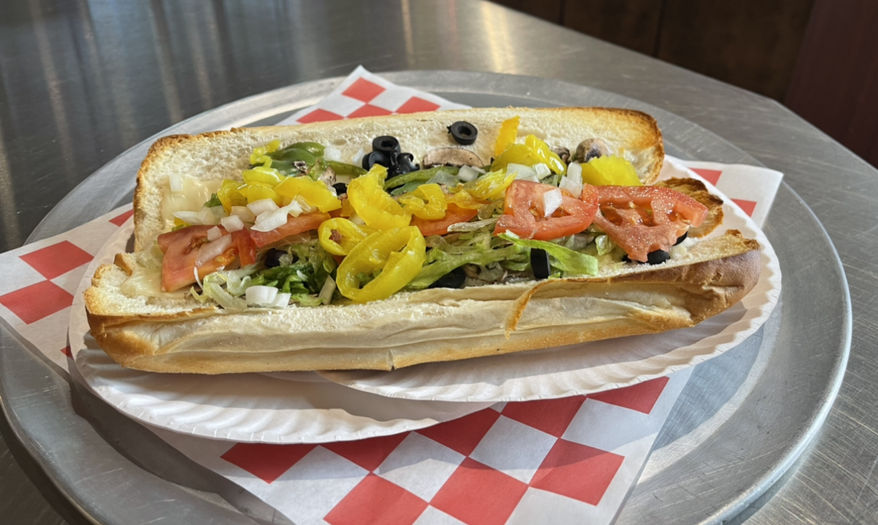 Order Veggie Sub food online from Johnny's Pizza store, Cary on bringmethat.com