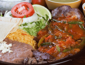 Order Bistec Ranchero Plate food online from Tostada Regia store, Houston on bringmethat.com