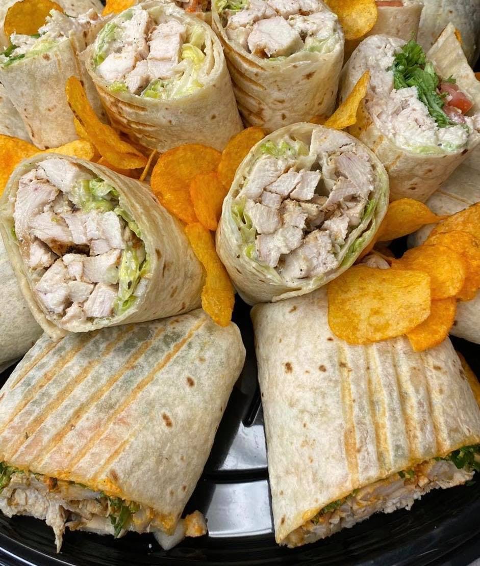 Order Chicken Caesar Wrap - Large food online from Listrani's store, McLean on bringmethat.com