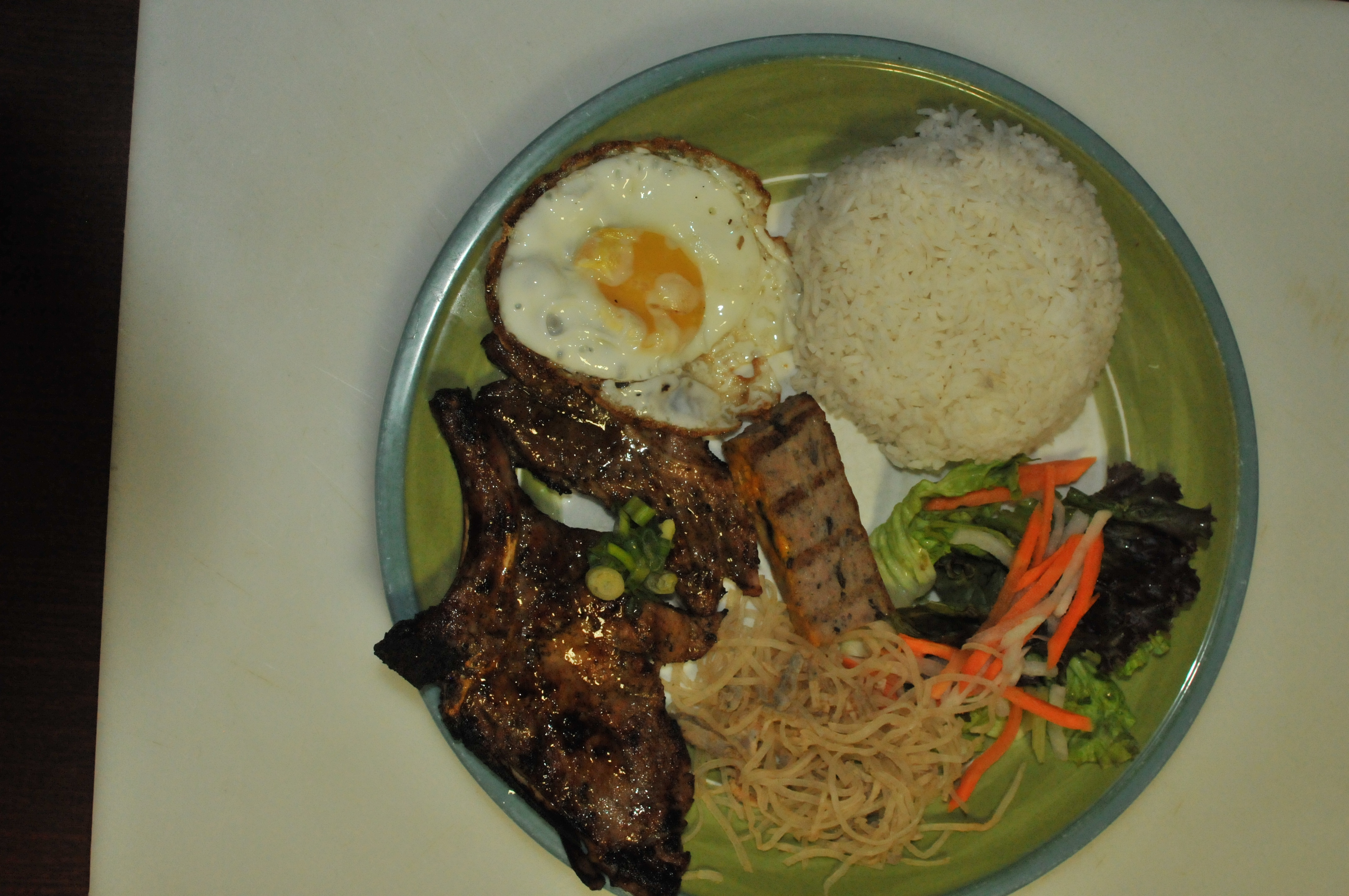 Order 100. Com Dac Biet/Special combination rice plate food online from Pho Bistro store, Malden on bringmethat.com