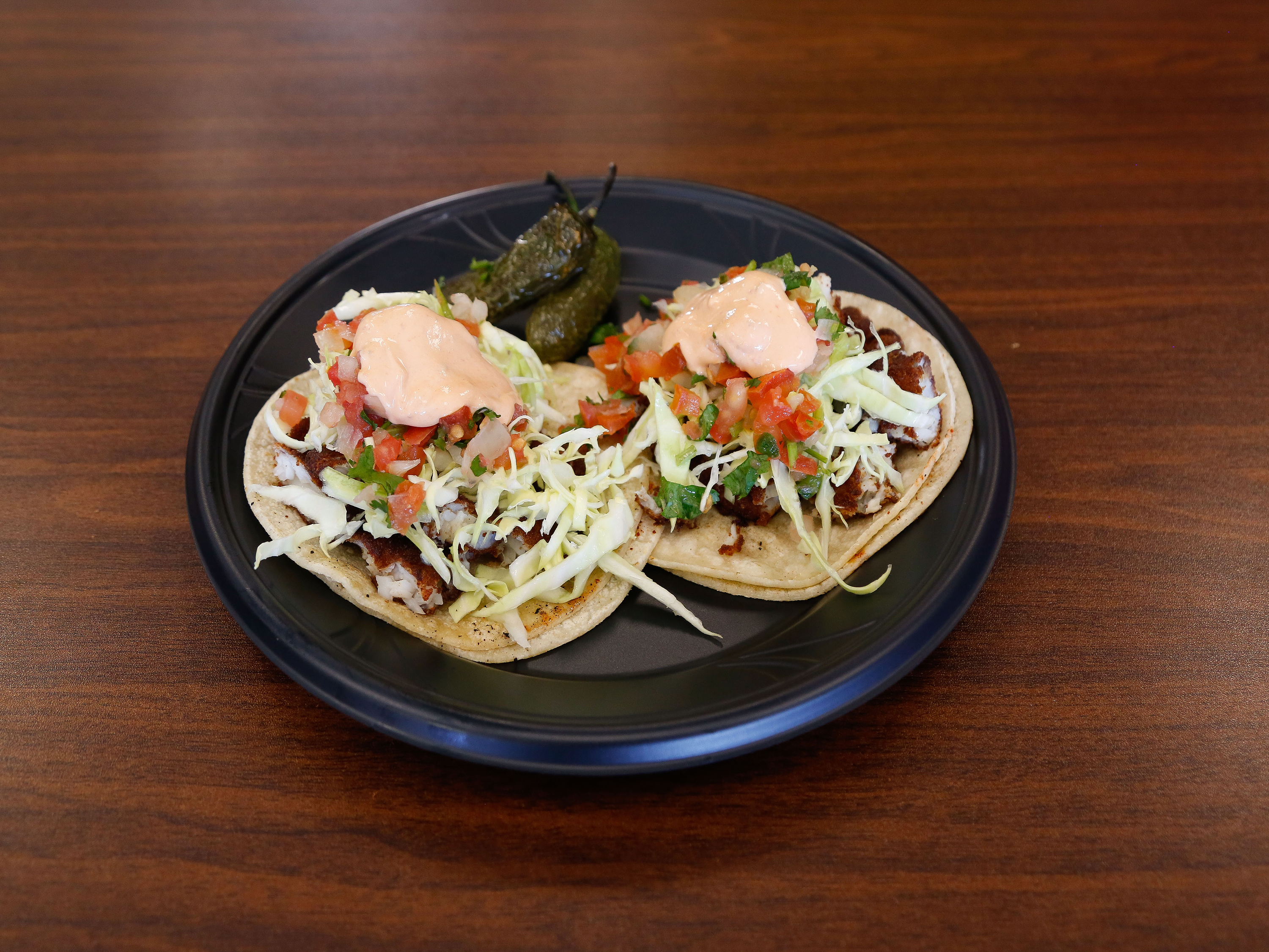 Order Pescado Taco food online from Hacienda Market & Grill store, Carson City on bringmethat.com