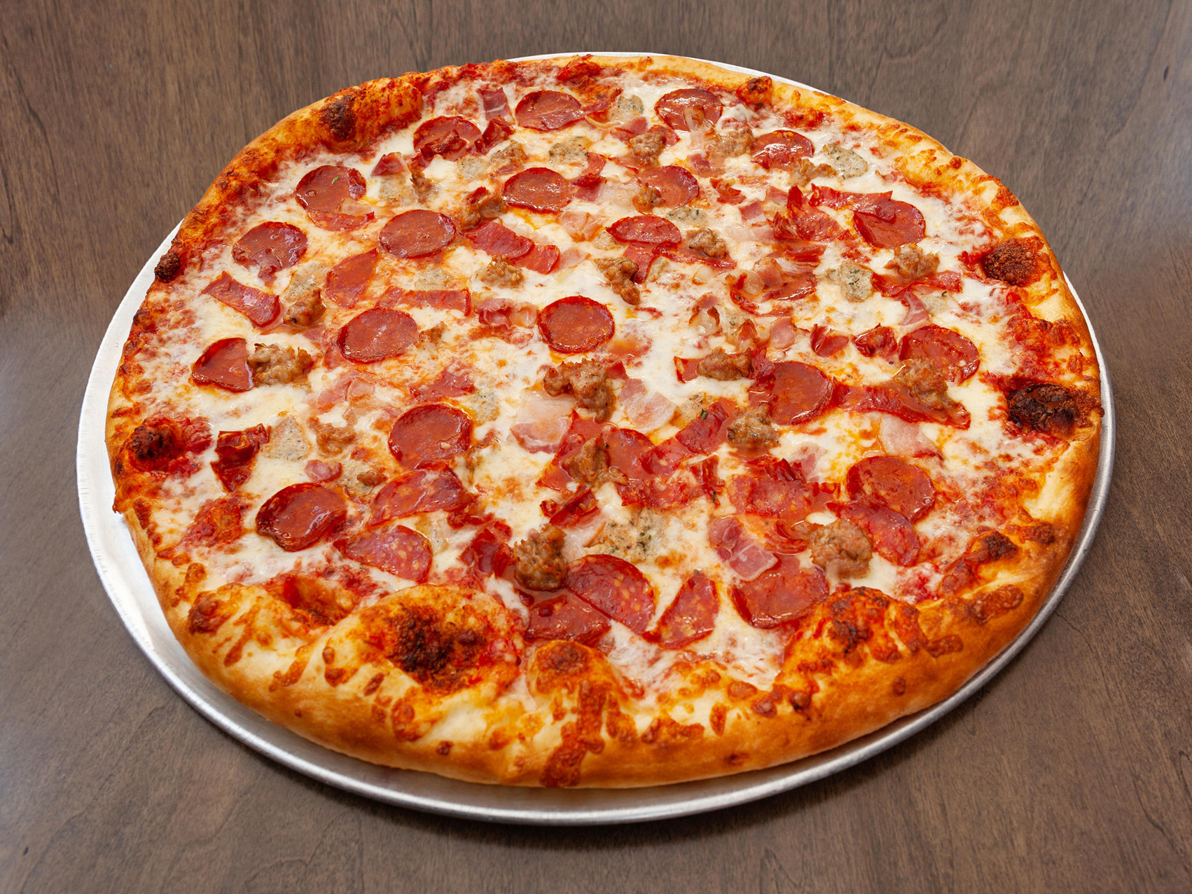 Order 20" Meat Lovers Pizza food online from Elbow Room store, Los Angeles on bringmethat.com
