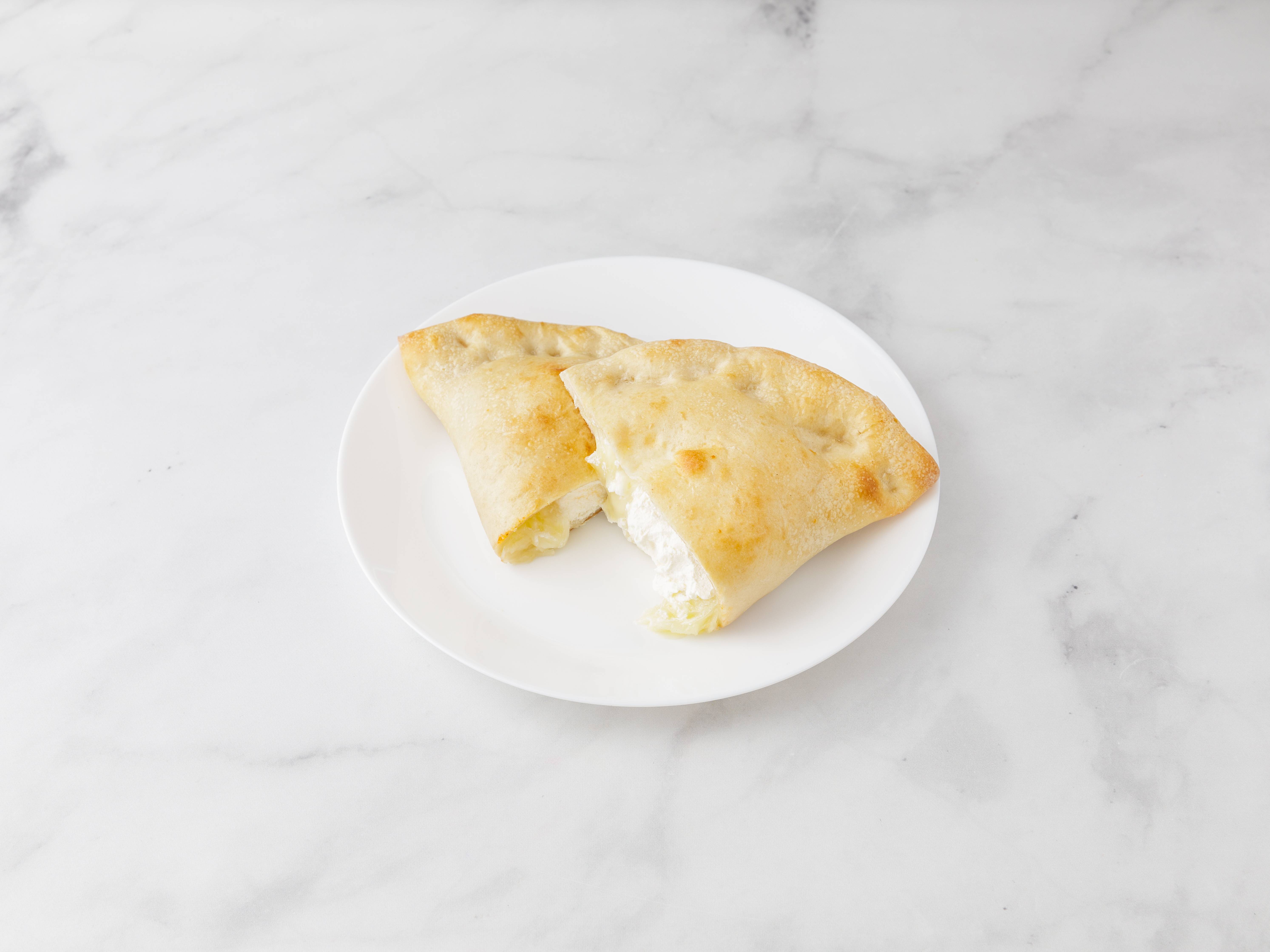Order Calzone food online from The Pizza Place store, Yonkers on bringmethat.com