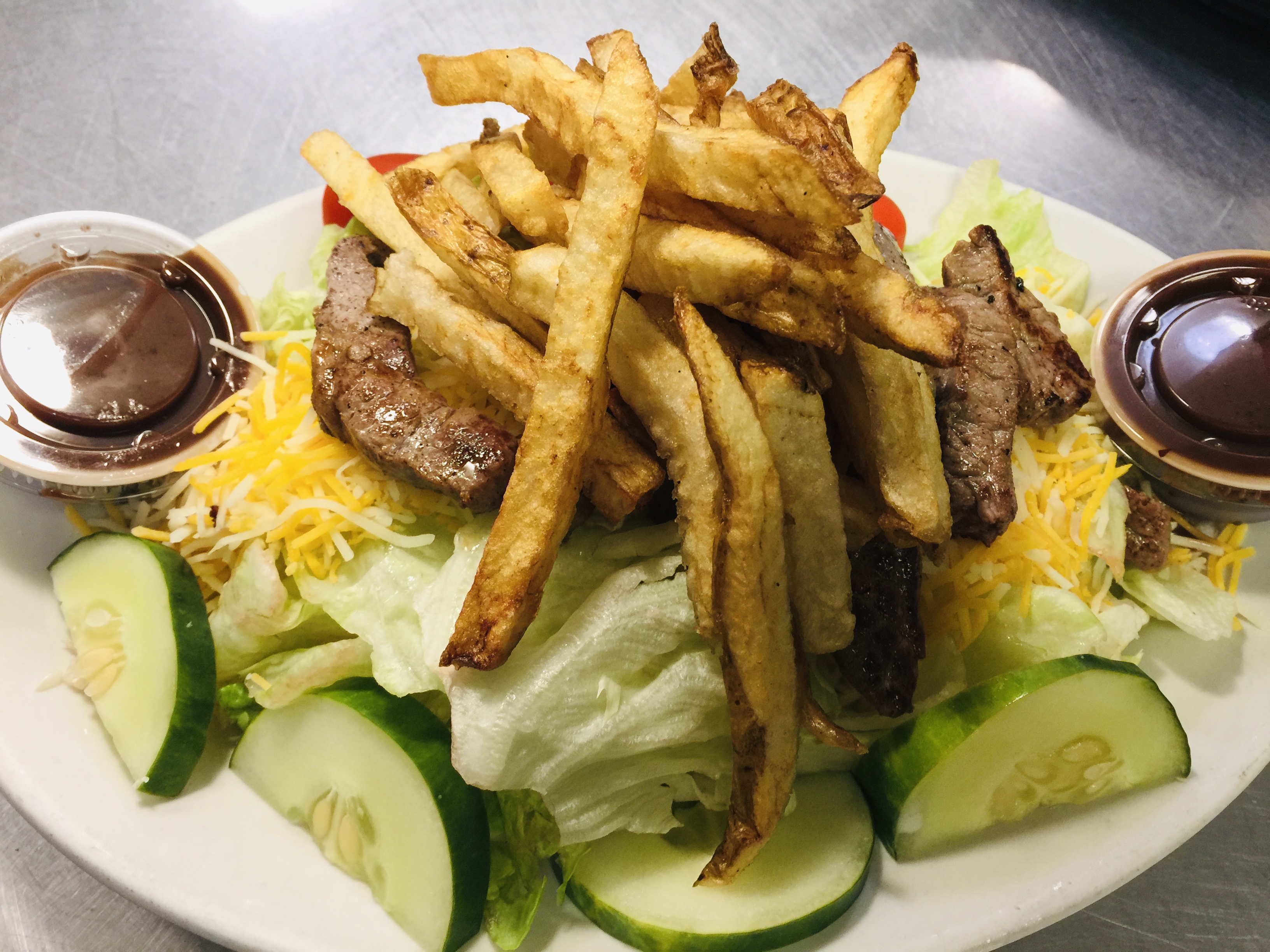 Order Steak Salad food online from Mojo Pub -N- Grill store, Youngstown on bringmethat.com