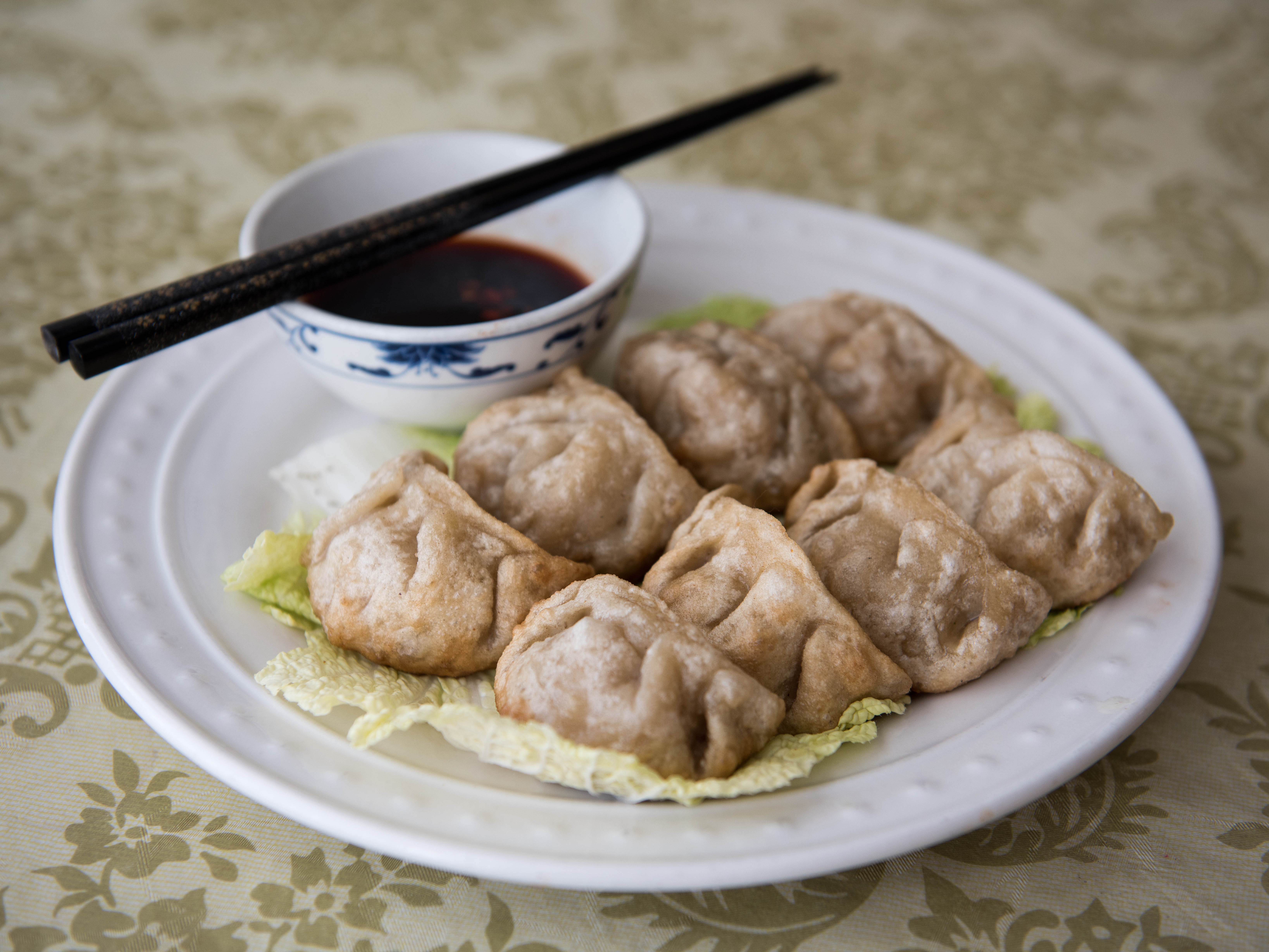 Order A9. Pan Fried Pork Dumpling food online from Chef Ding Asian Cuisine store, Houston on bringmethat.com