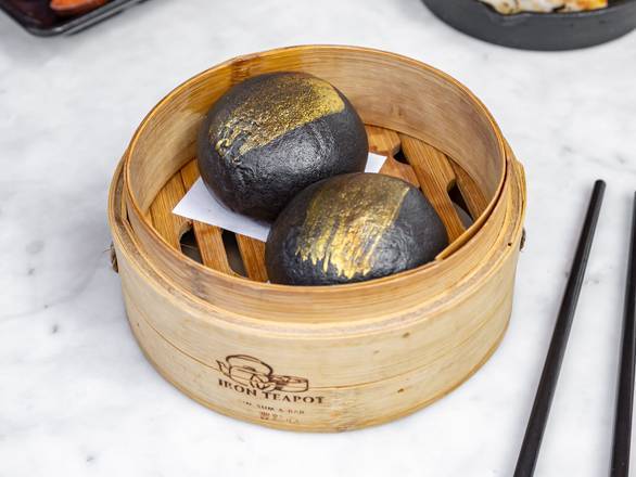 Order Black Squid Ink Lava Bao - Lao Sa Bao food online from The Iron-Teapot store, Los Angeles on bringmethat.com