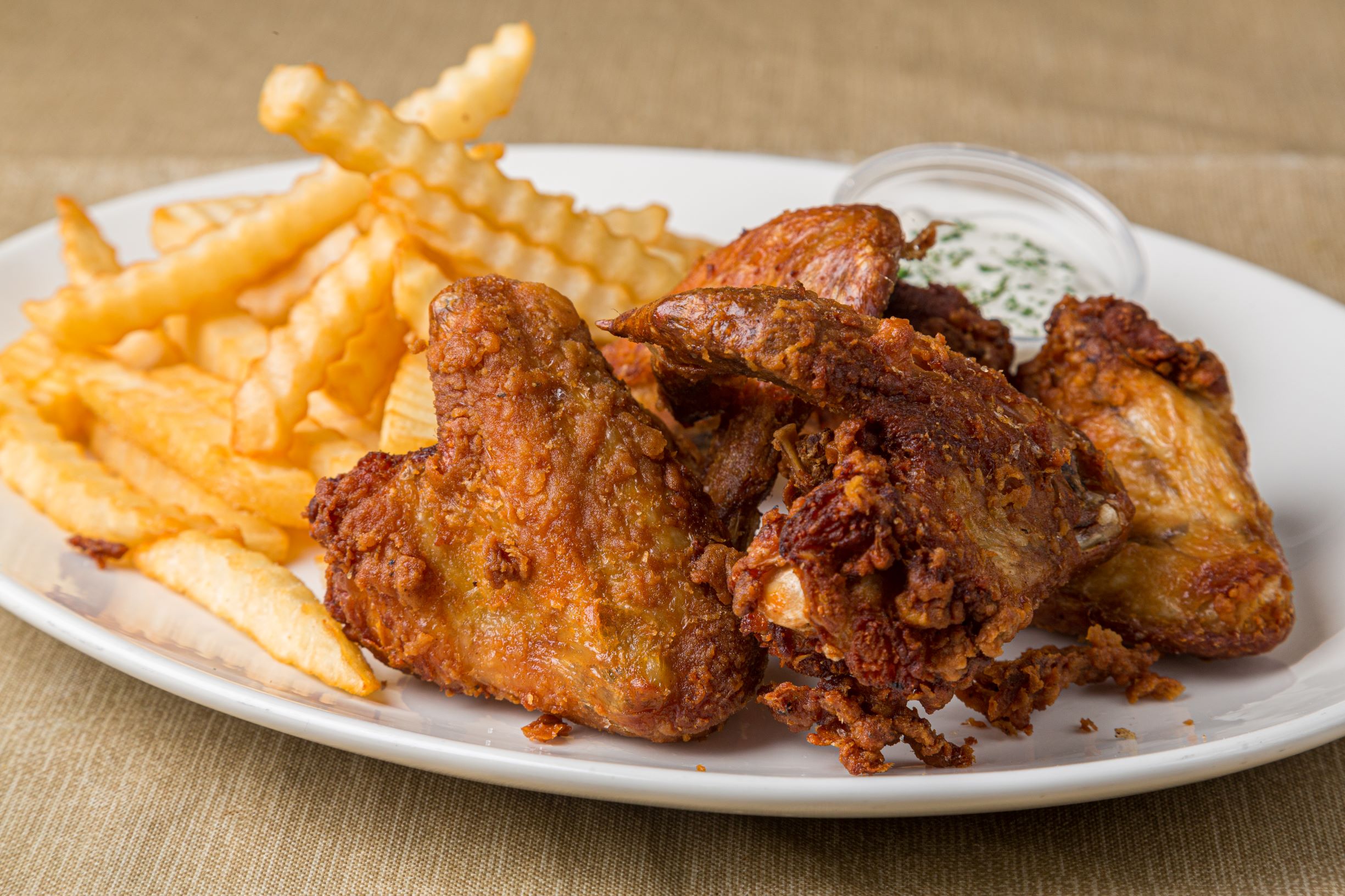 Order Crispy wings and Fries food online from Hot Spot Deli store, Yonkers on bringmethat.com