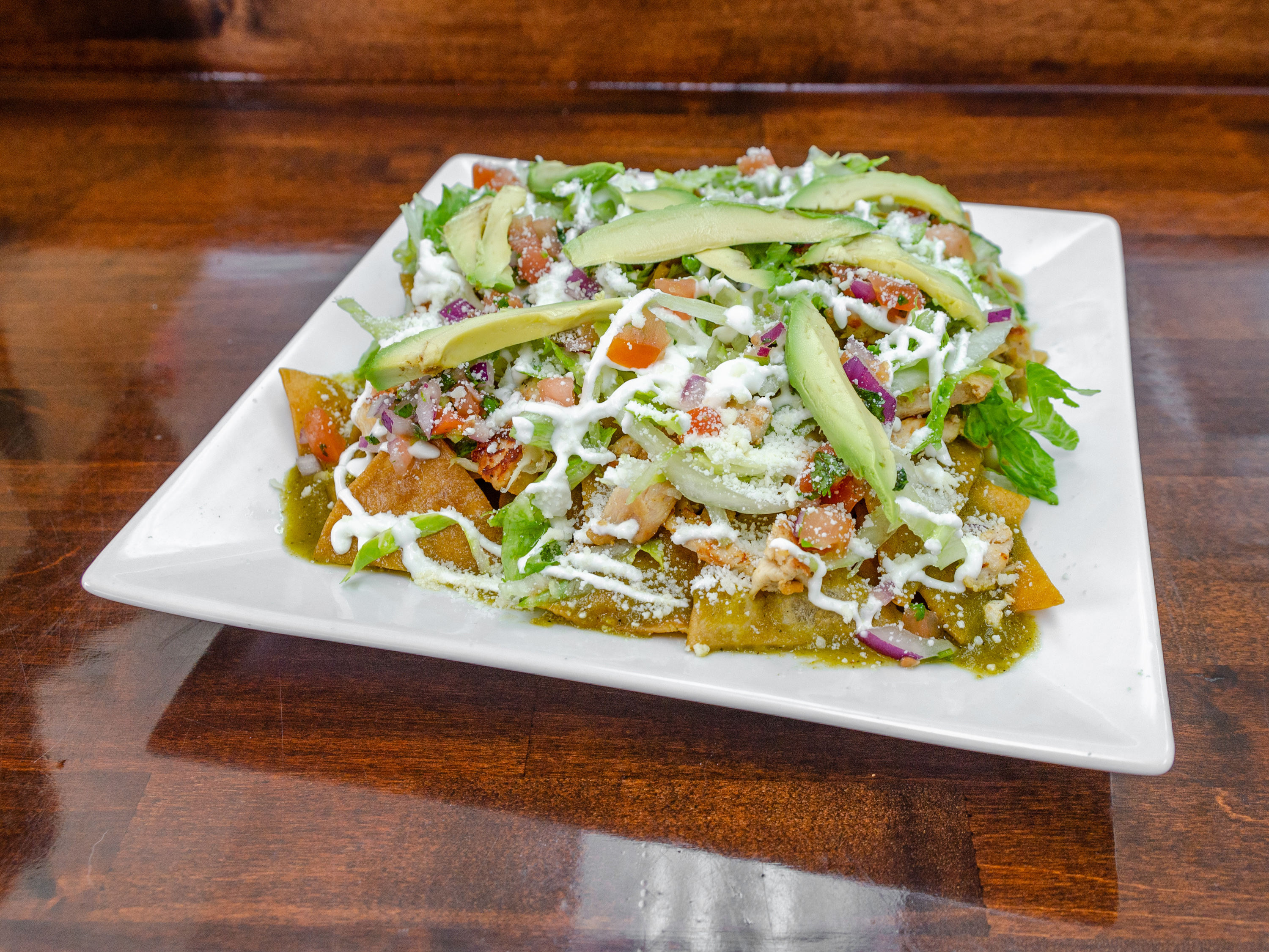 Order Chilaquiles food online from Avila Taqueria & Restaurant store, West New York on bringmethat.com