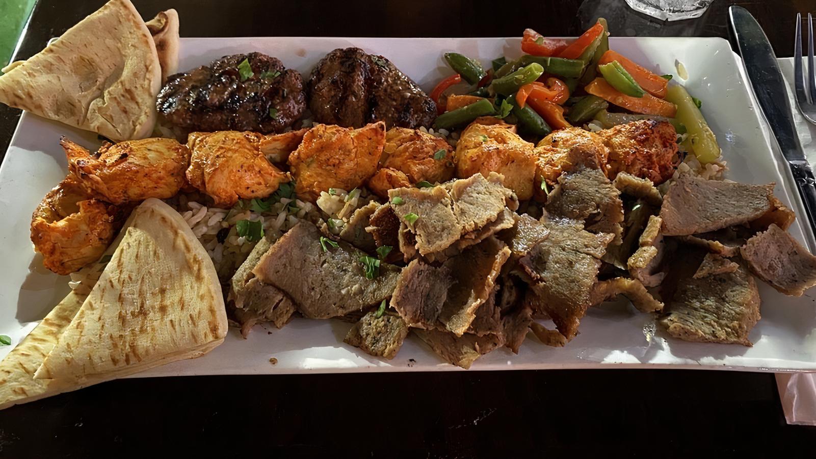 Order Coach's Mixed Grill food online from Hurricanes Bar & Grill store, Huntington Beach on bringmethat.com