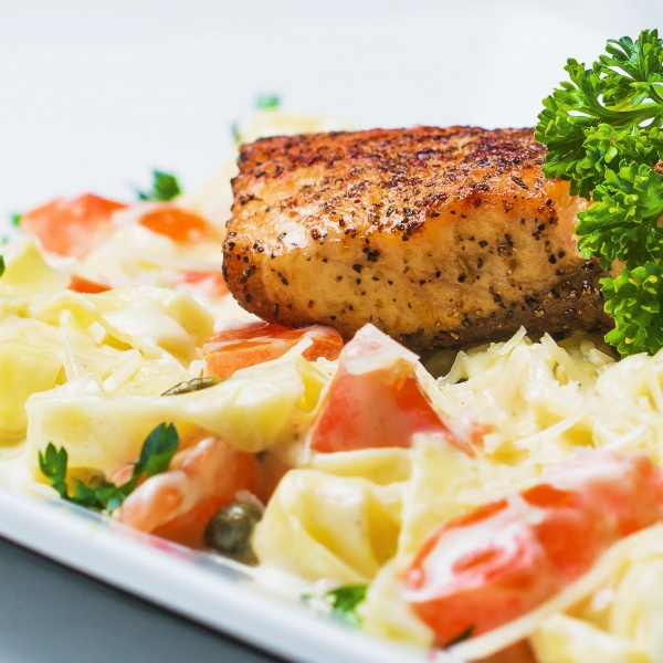Order Salmon Fettuccine  food online from Soprano's Pizza & Pasta store, Seattle on bringmethat.com