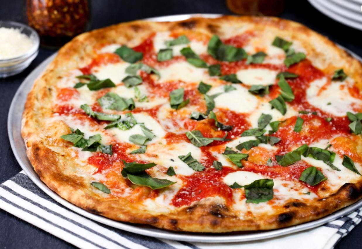 Order Neapolitan Margherita Pizza - 10'' food online from Patxi's Chicago Pizza store, San Francisco on bringmethat.com
