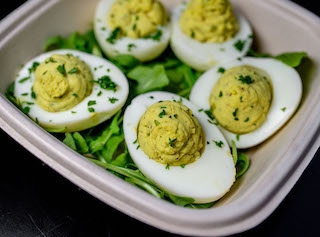Order Deviled Eggs (5) food online from Bakers Daughter store, Washington on bringmethat.com