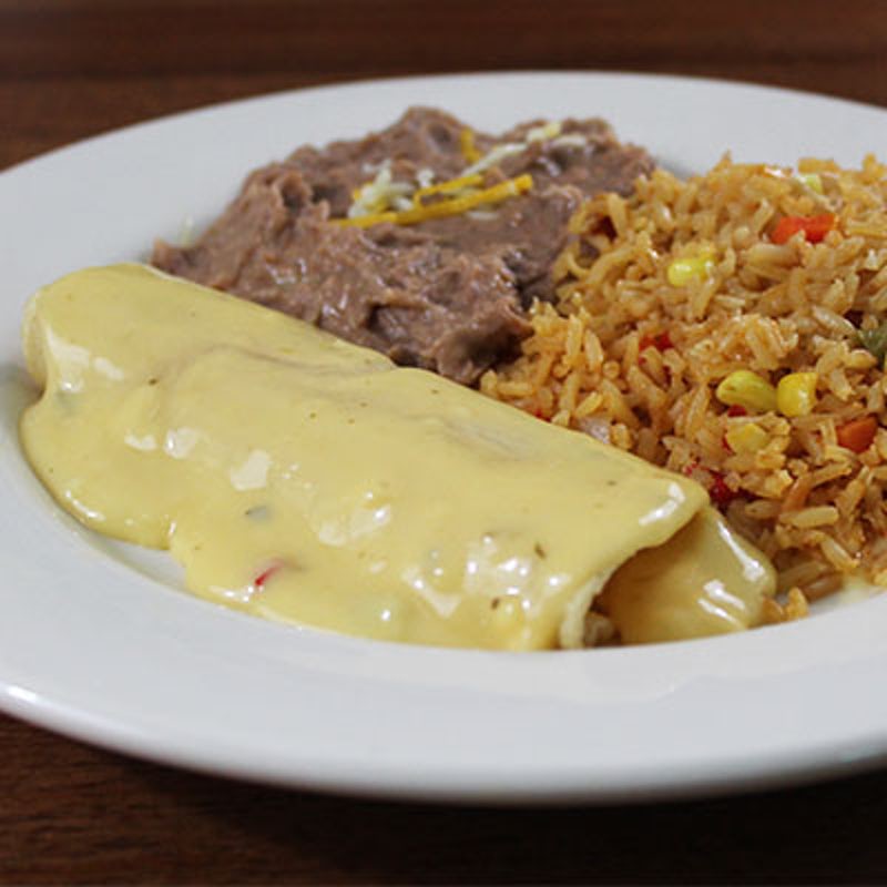 Order Kid's Enchilada with Queso food online from Abuelo's Mexican Restaurant store, Amarillo on bringmethat.com