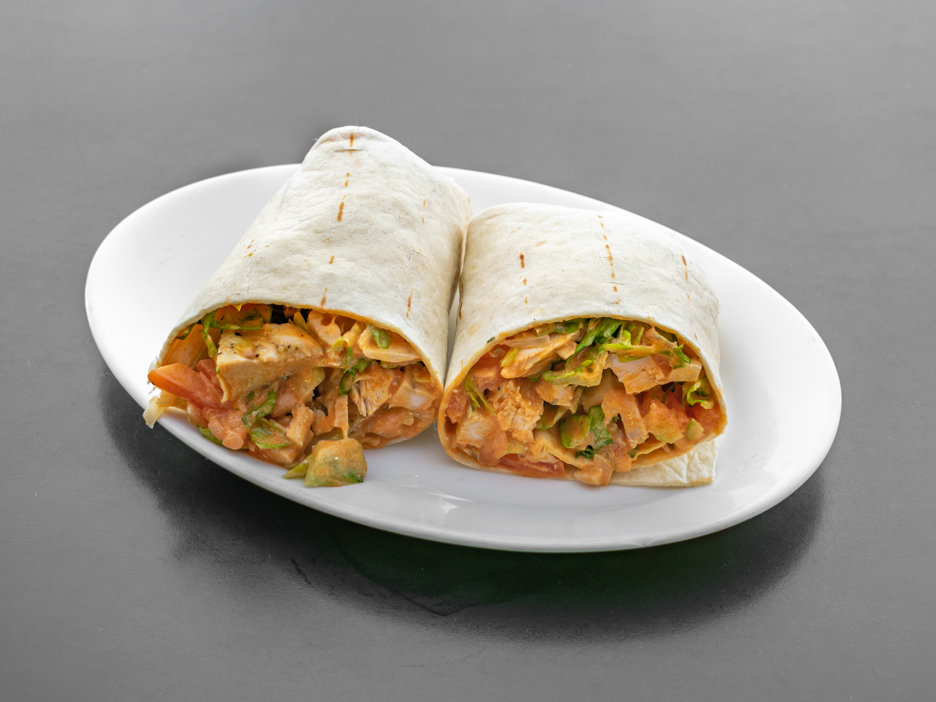 Order Buffalo Chicken Wrap with Fries  food online from Luigis Famous Pizza Restaurante store, Lincroft on bringmethat.com