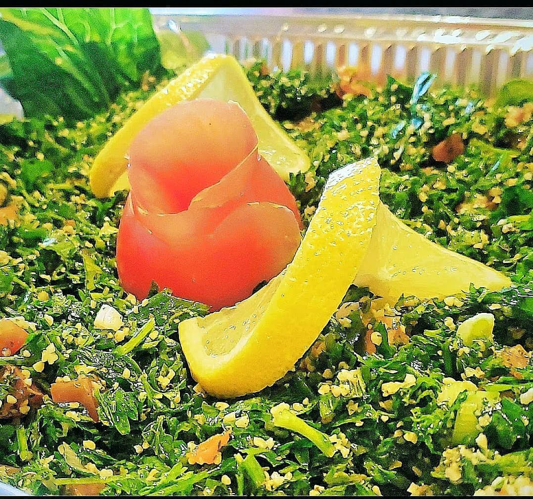 Order LG Tabouli Salad food online from Phoenicia Cafe store, Gilbert on bringmethat.com