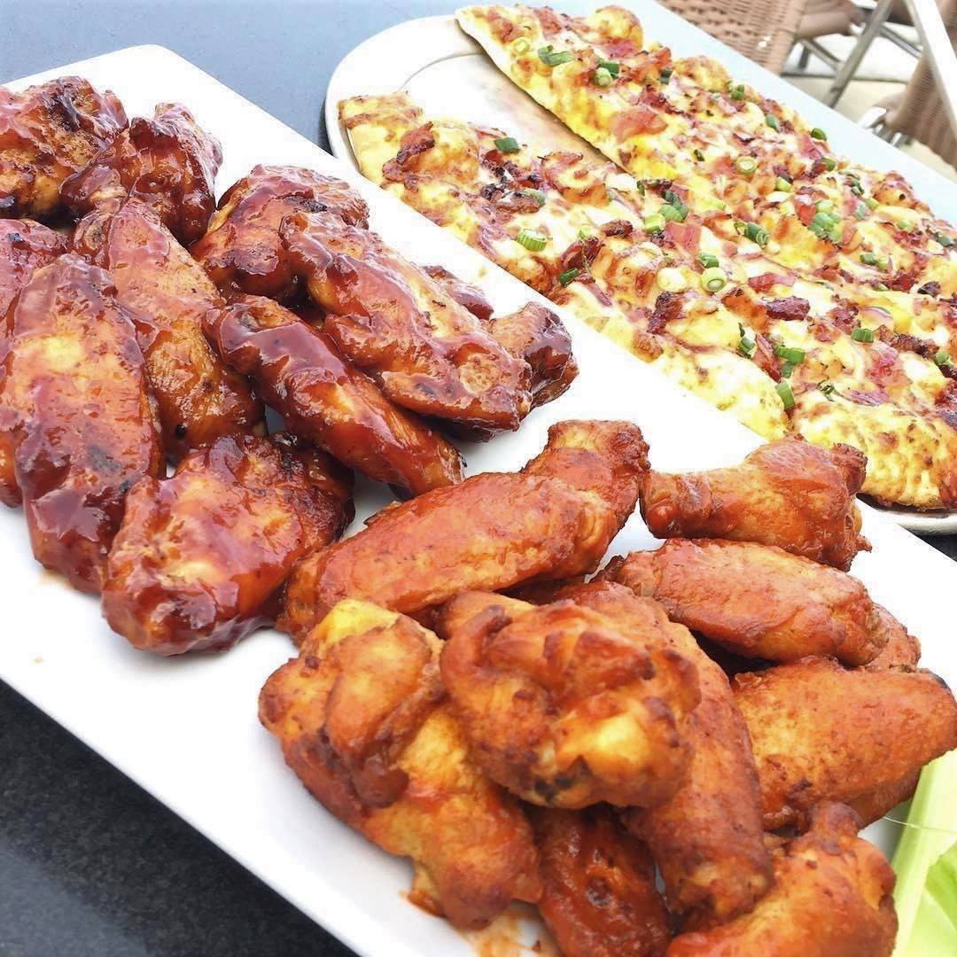 Order 24 Piece Wings food online from Round Table Pizza store, Redondo Beach on bringmethat.com