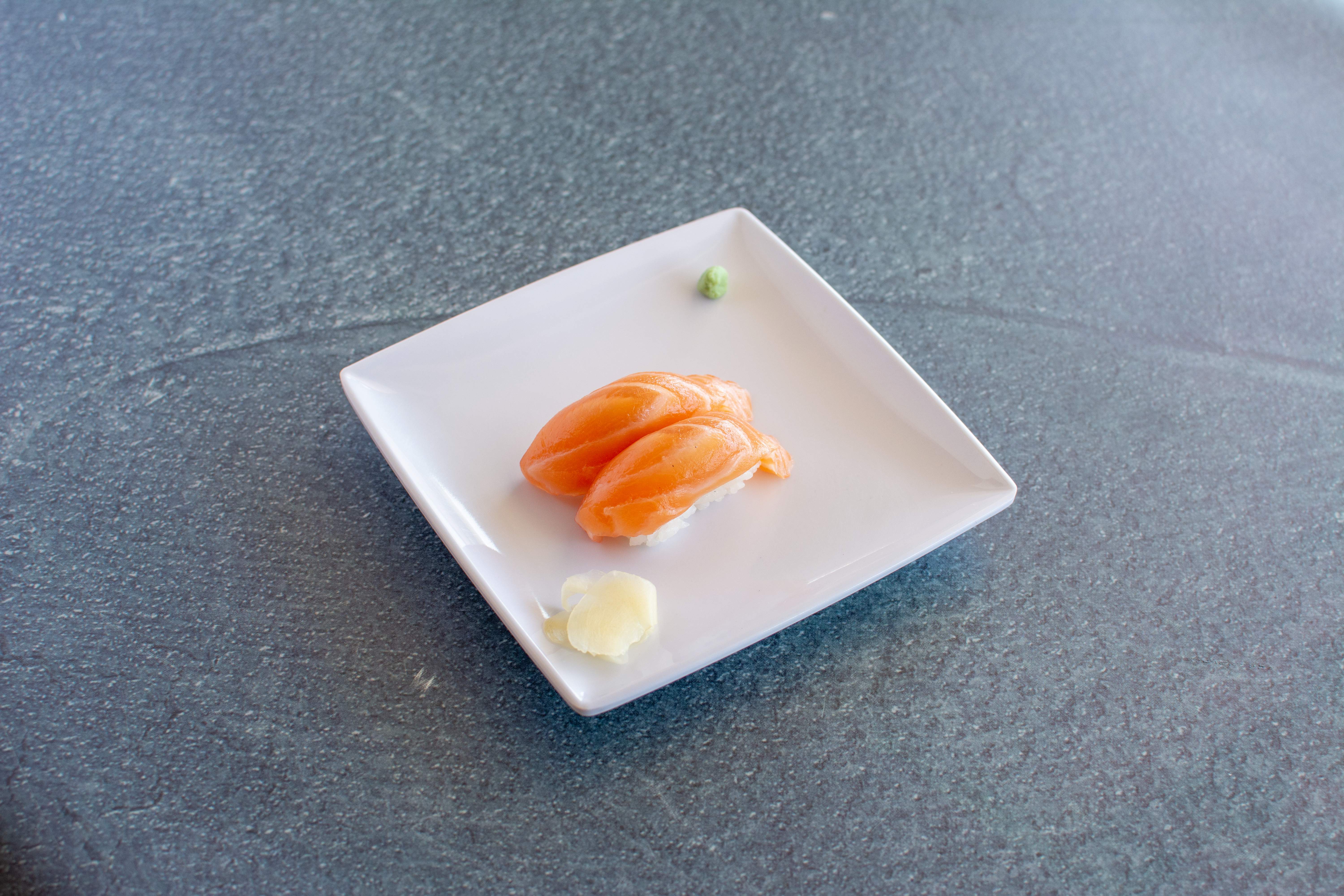Order 2 Pieces Salmon Sushi food online from Goyen Sushi & Robata store, Long Beach on bringmethat.com