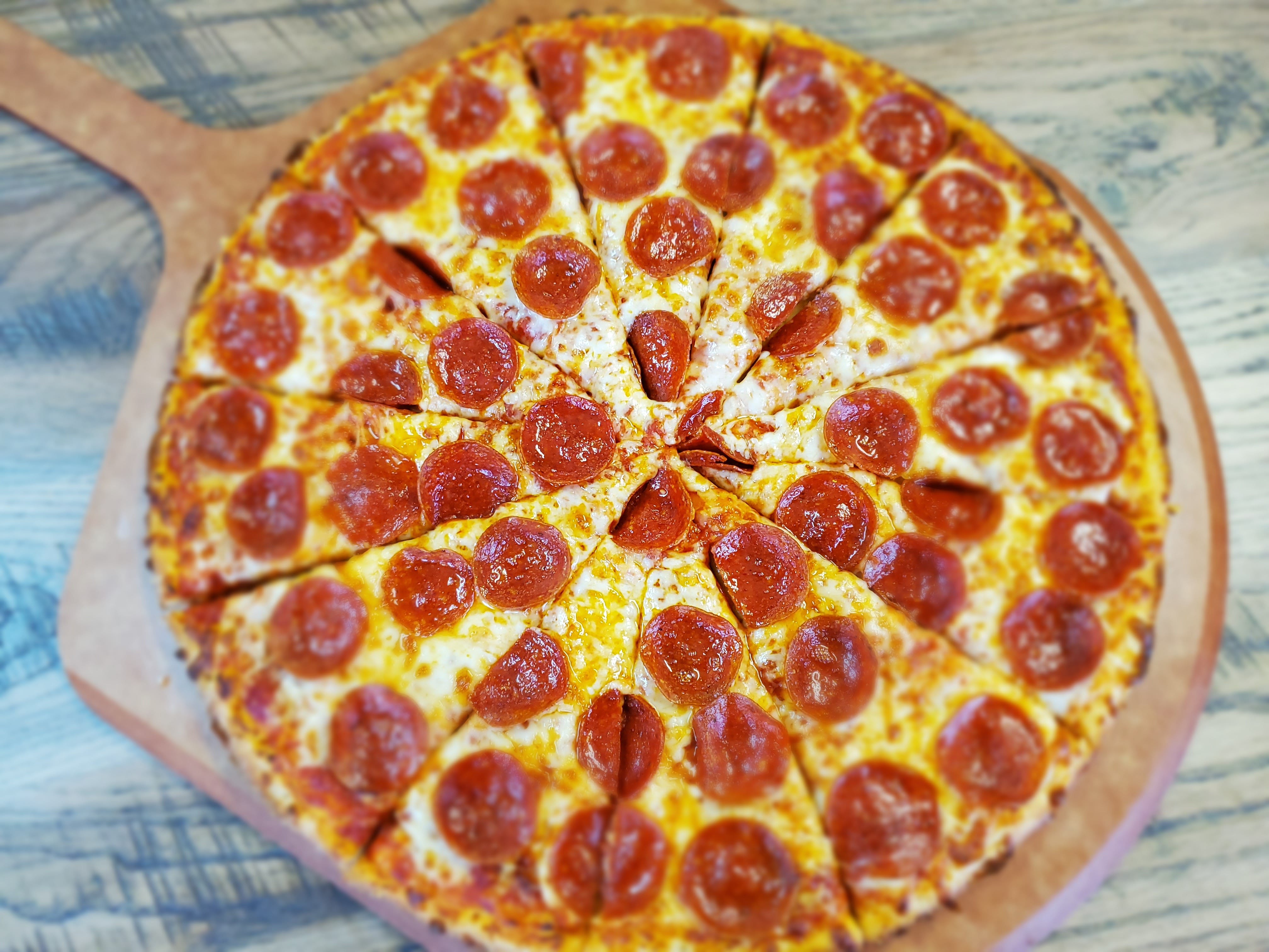 Order Round Pepperoni Pile Up Pizza - 7" (4 Slices) food online from Pizza Joes store, Beaver on bringmethat.com