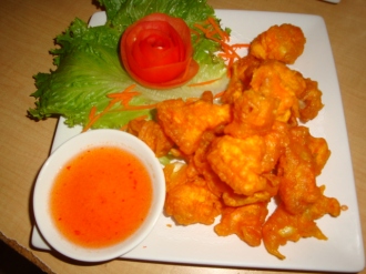 Order 8. Calamari food online from Nine & Nine Thai Kitchen store, Pasadena on bringmethat.com