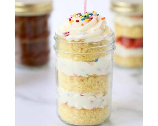 Order NEW Birthday Cake in a GLASS JAR with Handmade Buttercream food online from Valbella Midtown store, New York on bringmethat.com