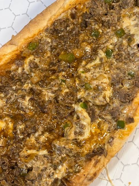 Order Buffalo Philly cheesesteak  with peppers onions and your choice of cheese (9oz of meat on a amoroso roll food online from From Philly To Charlit store, Charlotte on bringmethat.com