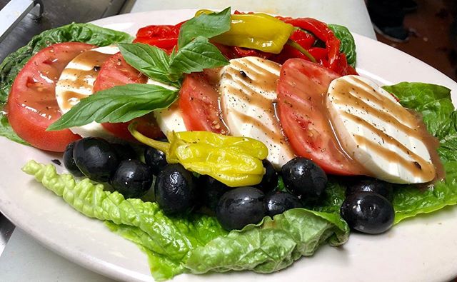 Order Caprese Salad food online from Calabria Pizza store, Oradell on bringmethat.com
