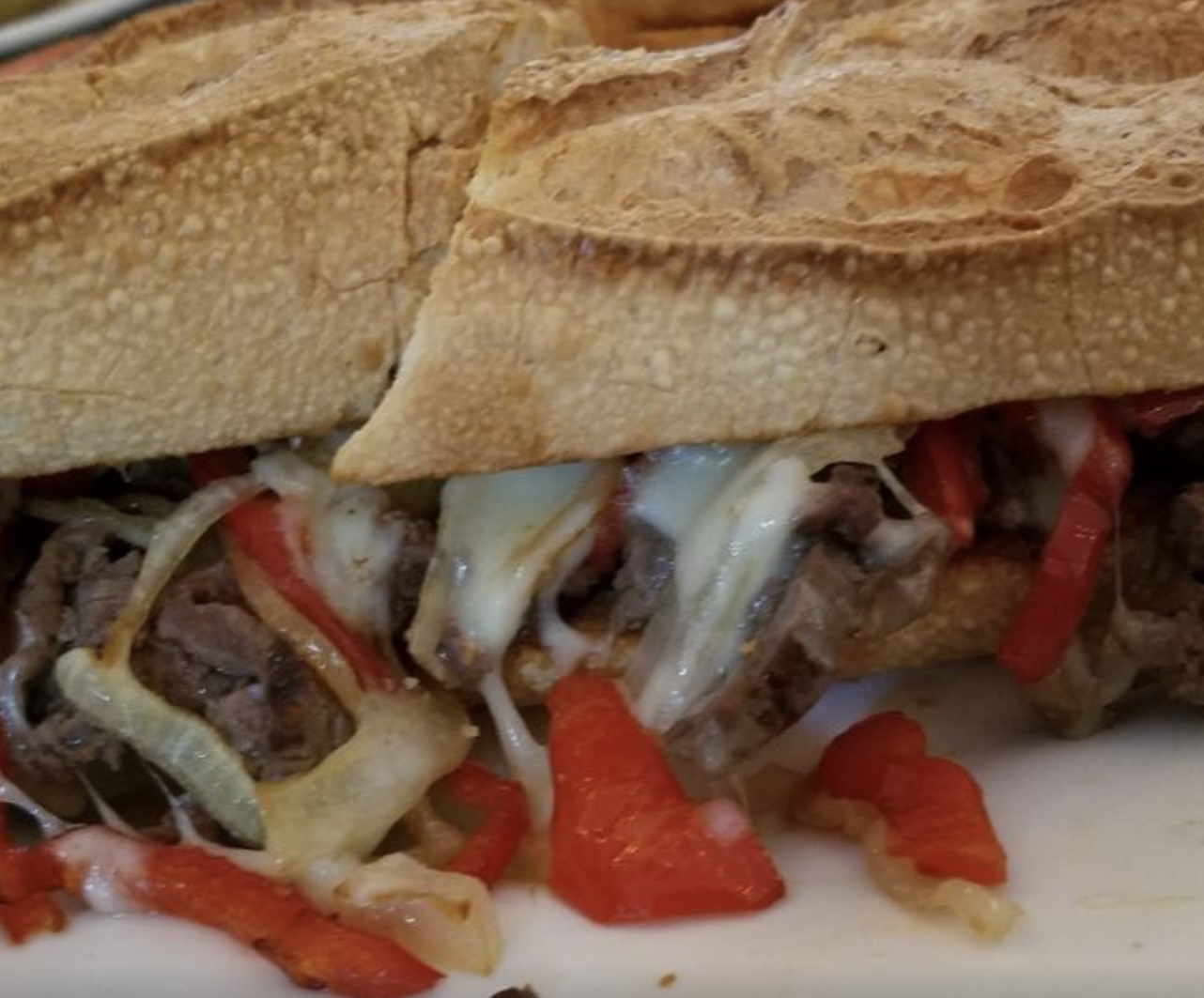 Order Steak Sandwich food online from Cappuccino Cafe store, Brooklyn on bringmethat.com