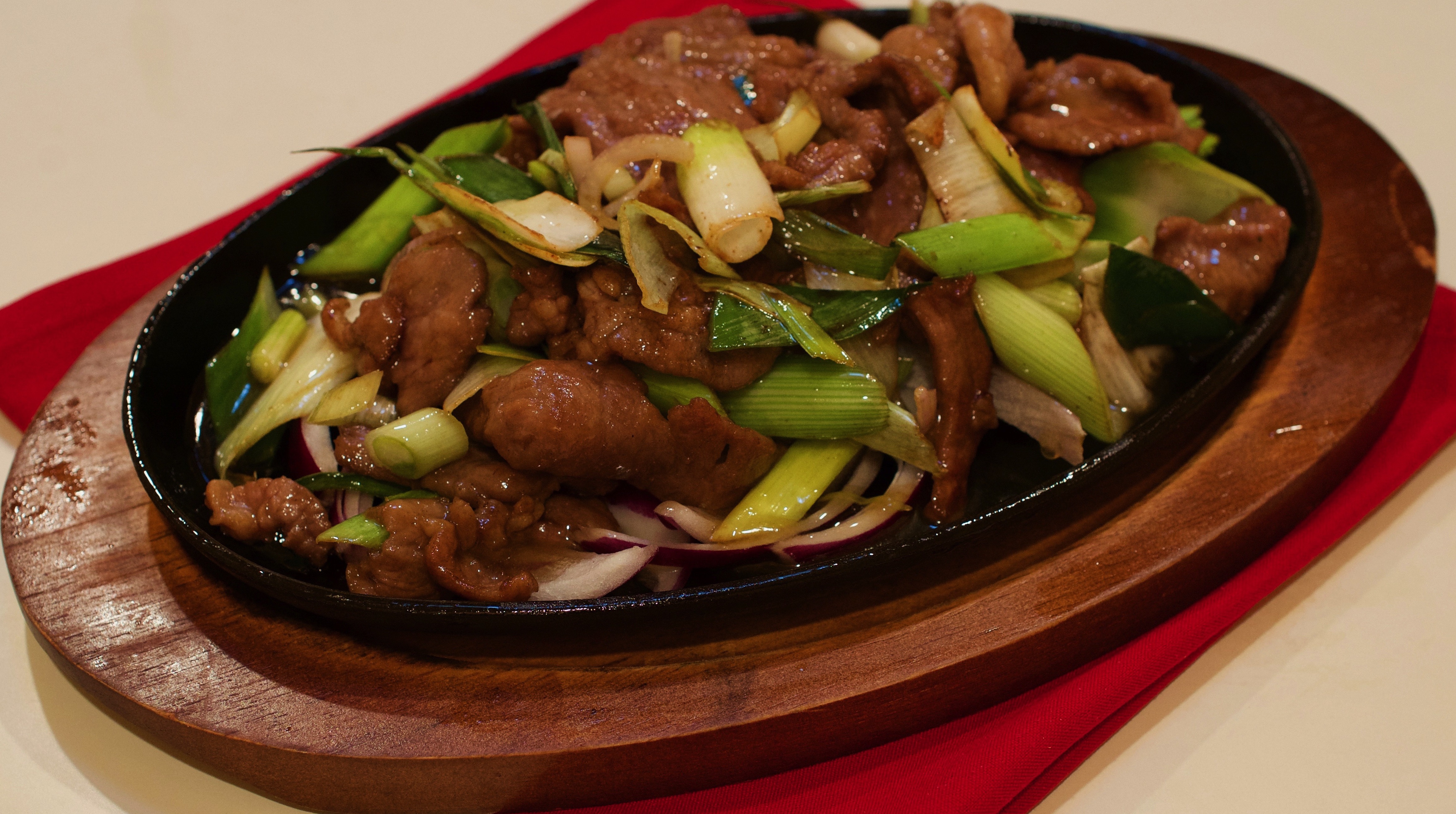 Order Sizzling Lamb Fillet with Scallion 京葱爆羊片 food online from Golden Coast store, San Francisco on bringmethat.com