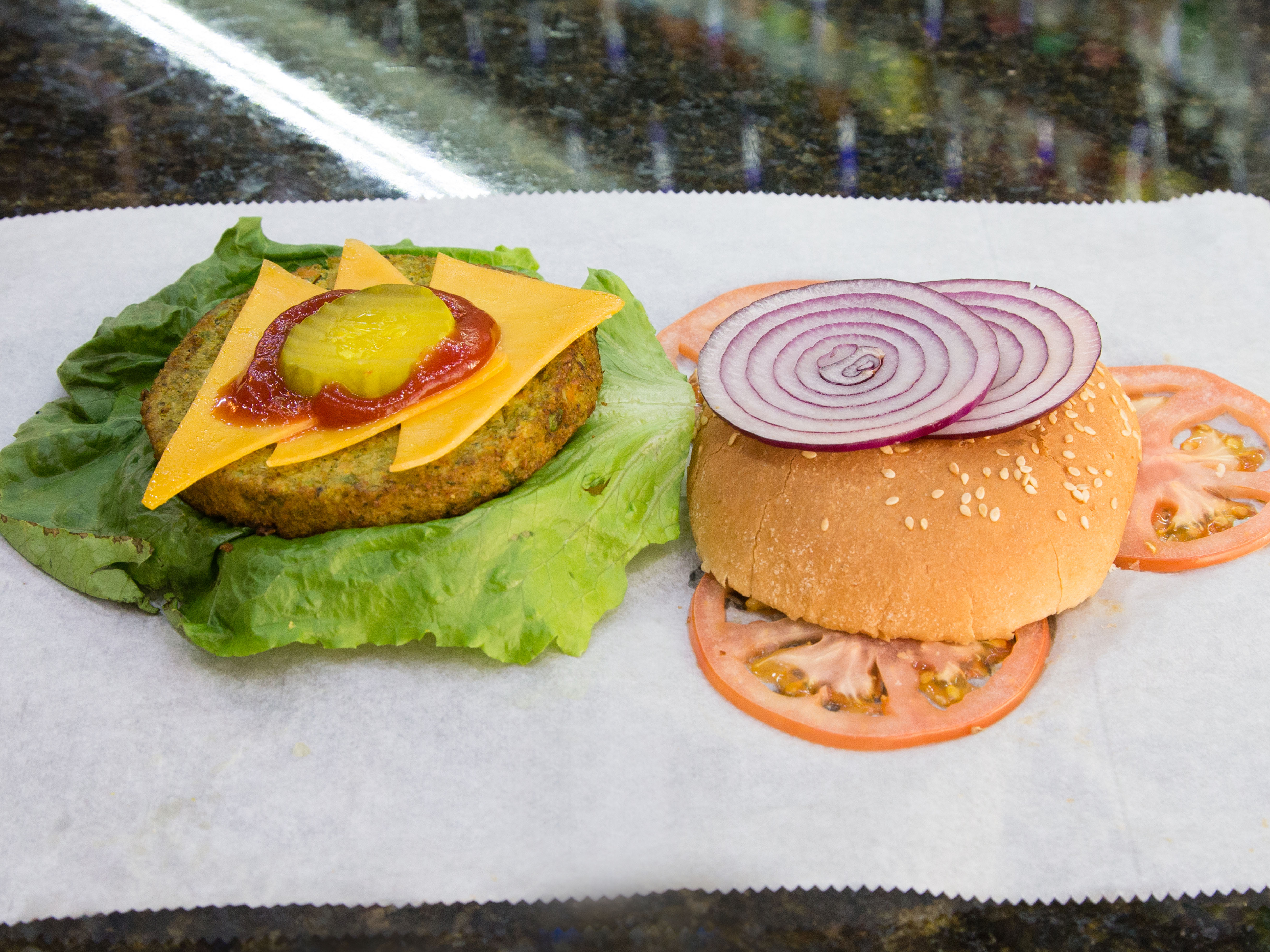 Order G54. Veggie Burger on a Bun food online from Metro Finest Deli store, Brooklyn on bringmethat.com
