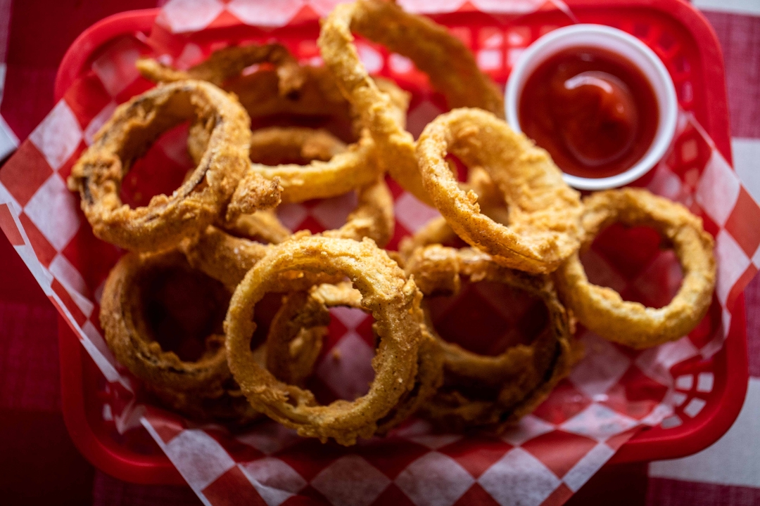 Order Onion Rings food online from The Texan Cafe & Pie Shop store, Hutto on bringmethat.com
