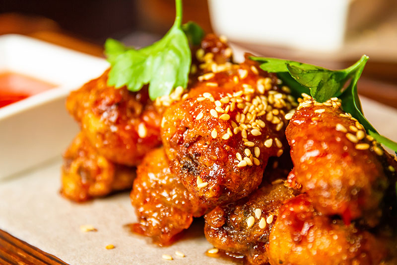 Order Thai sweet chili wings food online from The Chicken Hawkers store, Vacaville on bringmethat.com