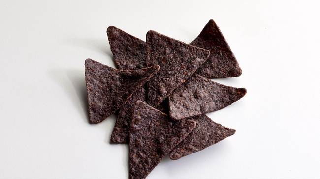 Order Bag of Blue Corn Chips (220 cal) food online from Jason's Deli store, Tulsa on bringmethat.com