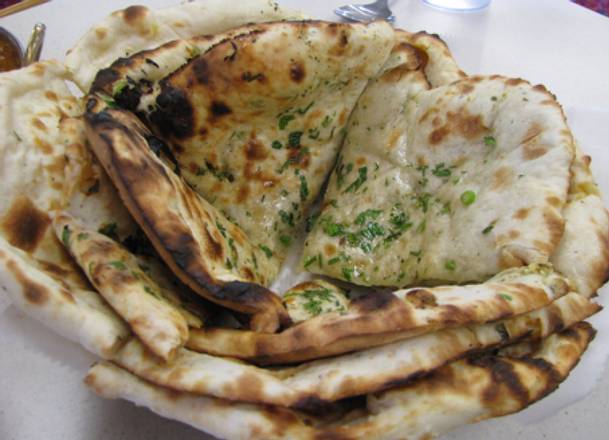 Order Garlic Naan food online from Halal Kitch store, Egg Harbor on bringmethat.com