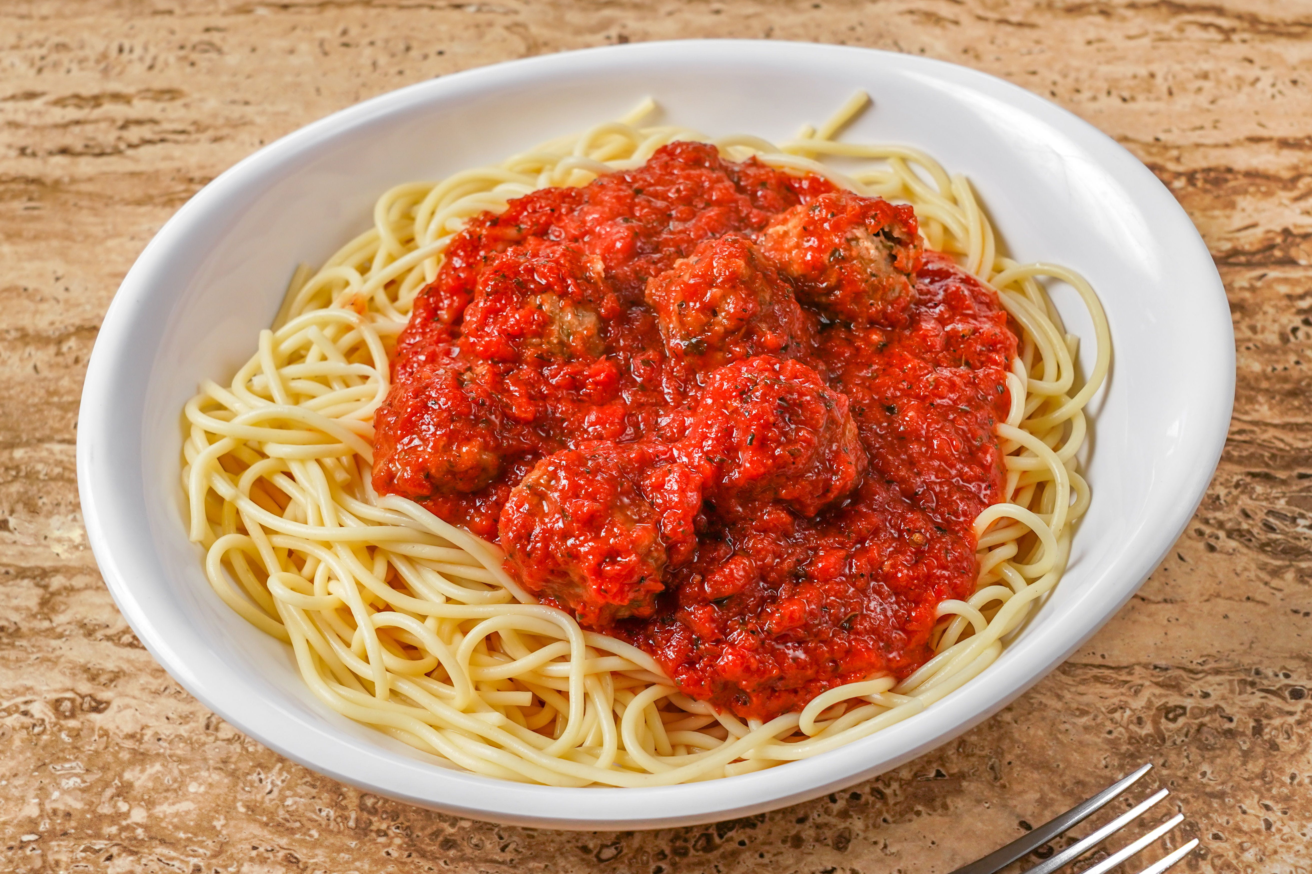 Order Spaghetti with Meatballs - Pasta food online from Chicagos Pizza store, San Antonio on bringmethat.com