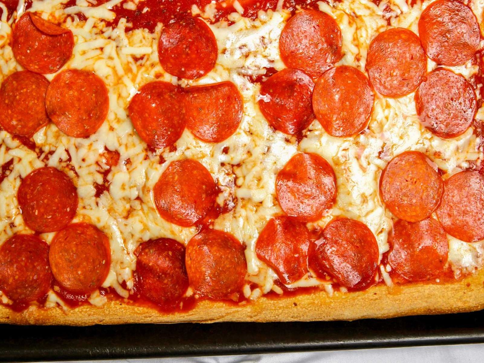 Order Pizza By The Cut food online from Jimmy Zs Pizza store, Houston on bringmethat.com