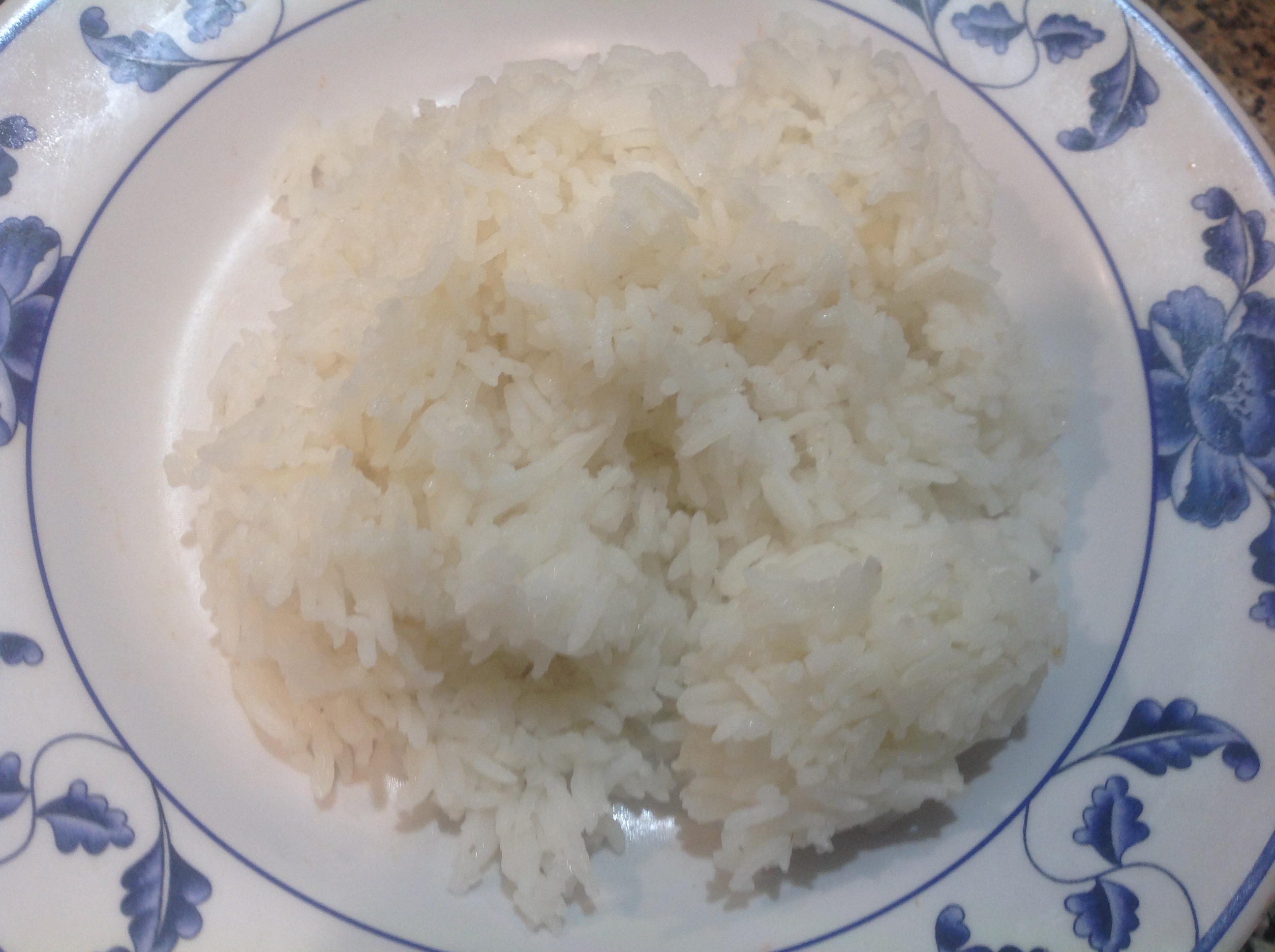 Order White Rice food online from Woodside Kitchen store, Elmhurst on bringmethat.com