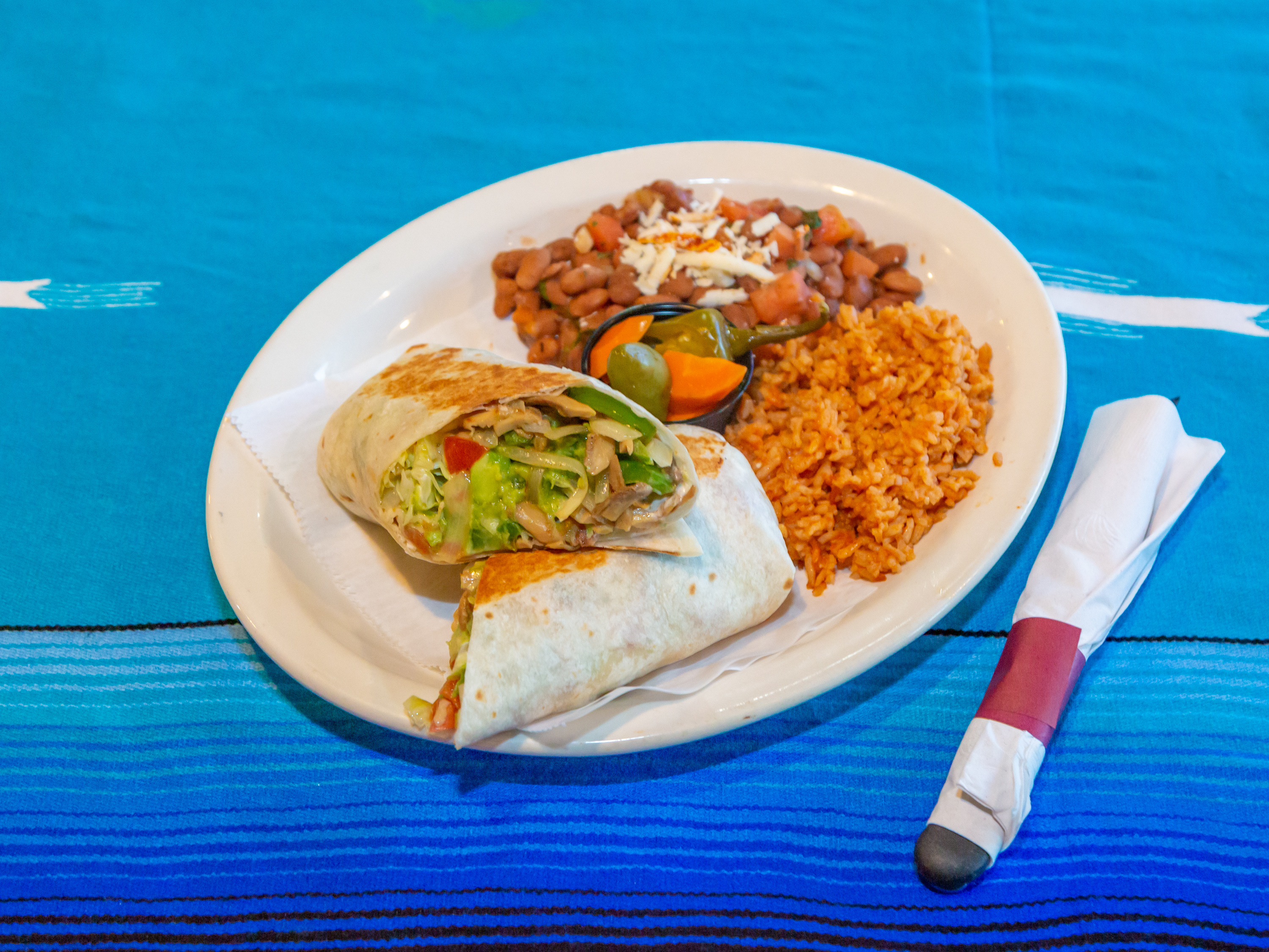 Order Supremo Dinner Burrito food online from El Cortez Restaurant store, Mokena on bringmethat.com