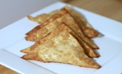 Order 蟹角 / Crab Rangoon food online from China King store, Lansdale on bringmethat.com