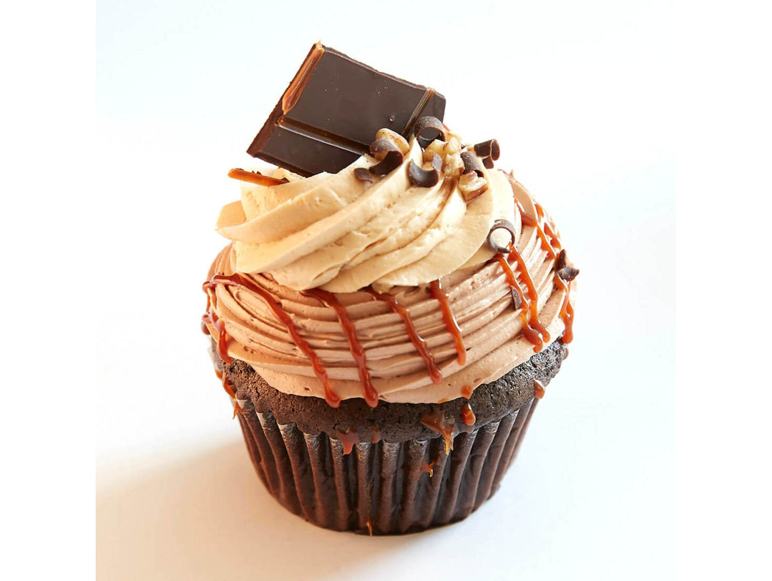 Order Turtle Cheesecake food online from Jilly Cupcake Bar & Ice Cream store, St. Louis on bringmethat.com