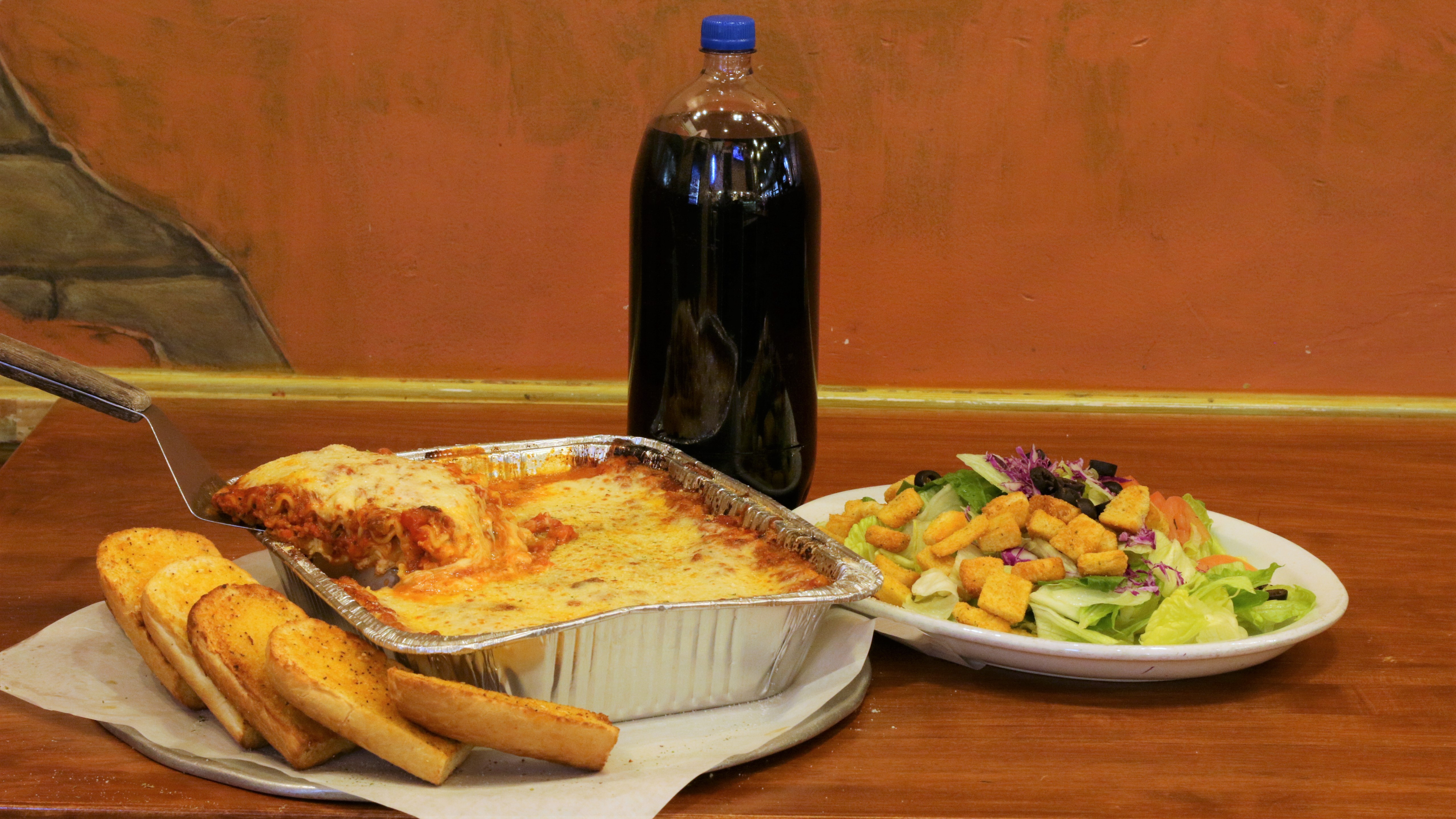Order Family Cheese Lasagna Dinner food online from Antonious Pizza Cafe store, Riverside on bringmethat.com