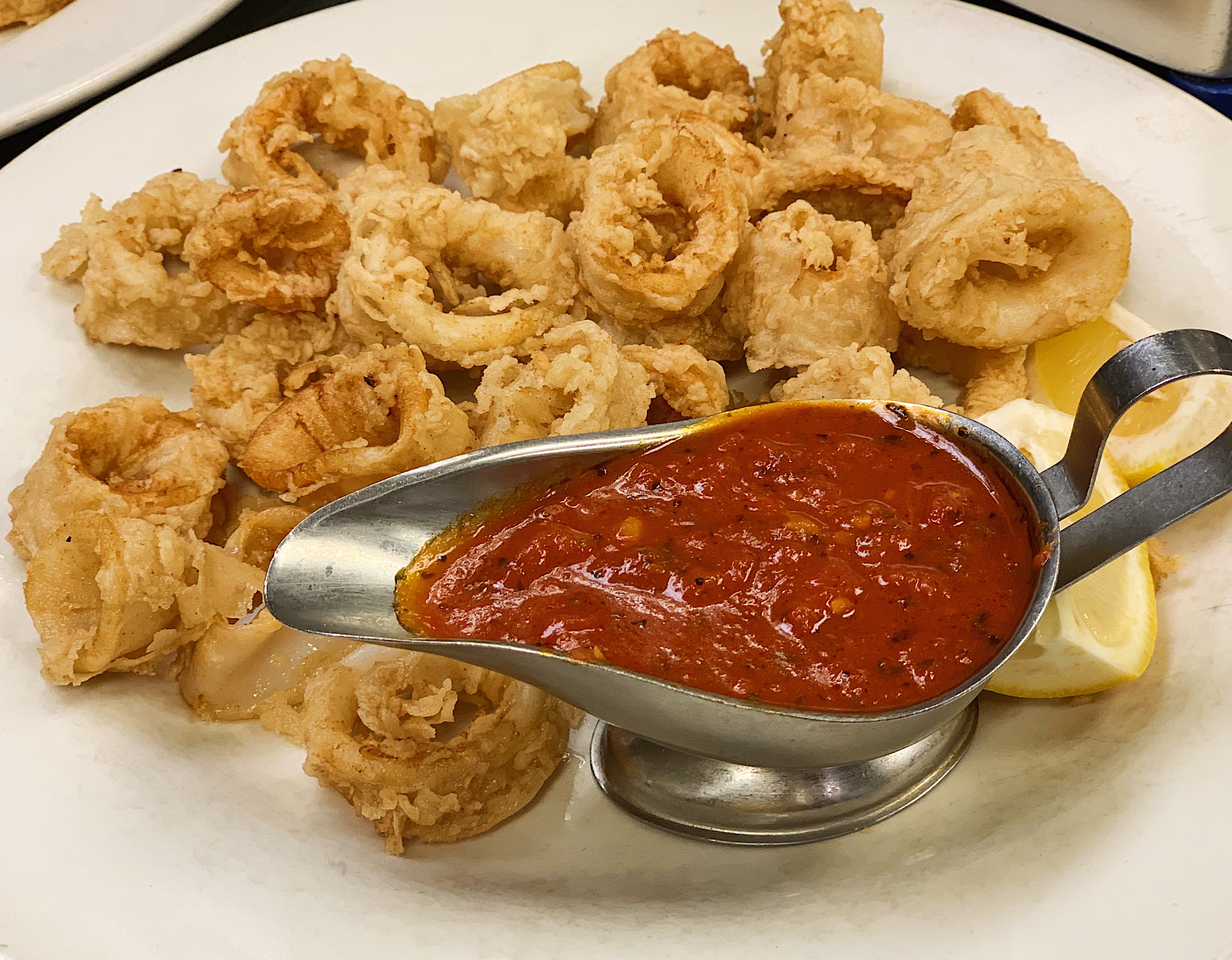 Order Calamari Fritti - Appetizer food online from La Scarpetta Italian Restaurant store, West Long Branch on bringmethat.com