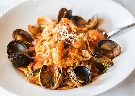 Order Linguine Pescatore food online from Louises Trattoria store, Los Angeles on bringmethat.com