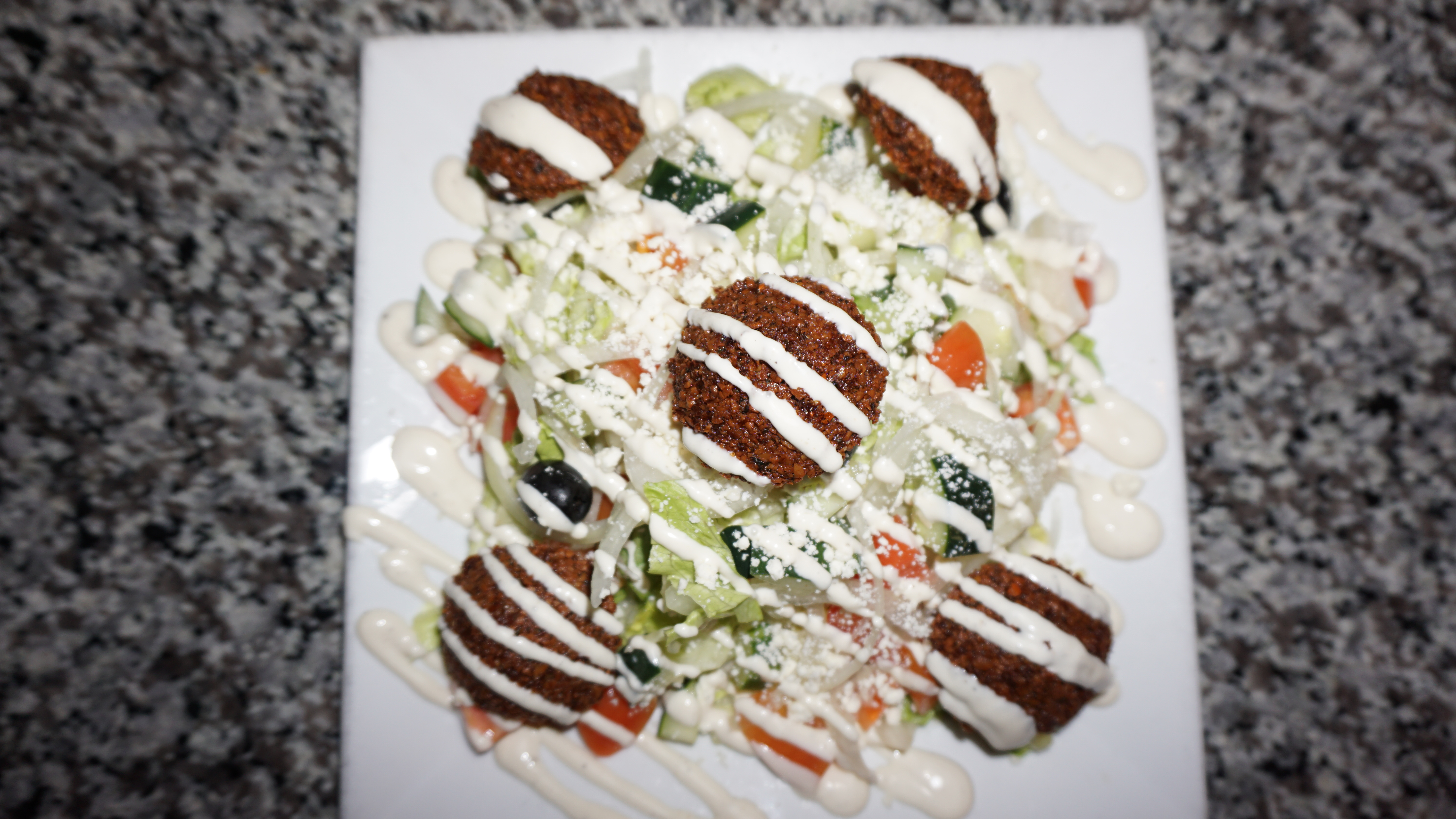 Order Greek Salad food online from Golden Fingers store, Minneapolis on bringmethat.com
