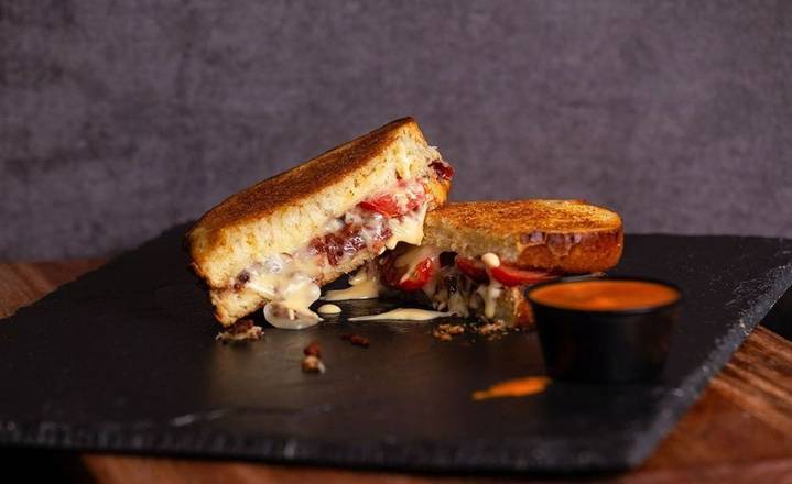 Order Bacon, Love, Tomato (BLT) Grilled Cheese - Uber food online from I Heart Mac and Cheese store, Urbana on bringmethat.com