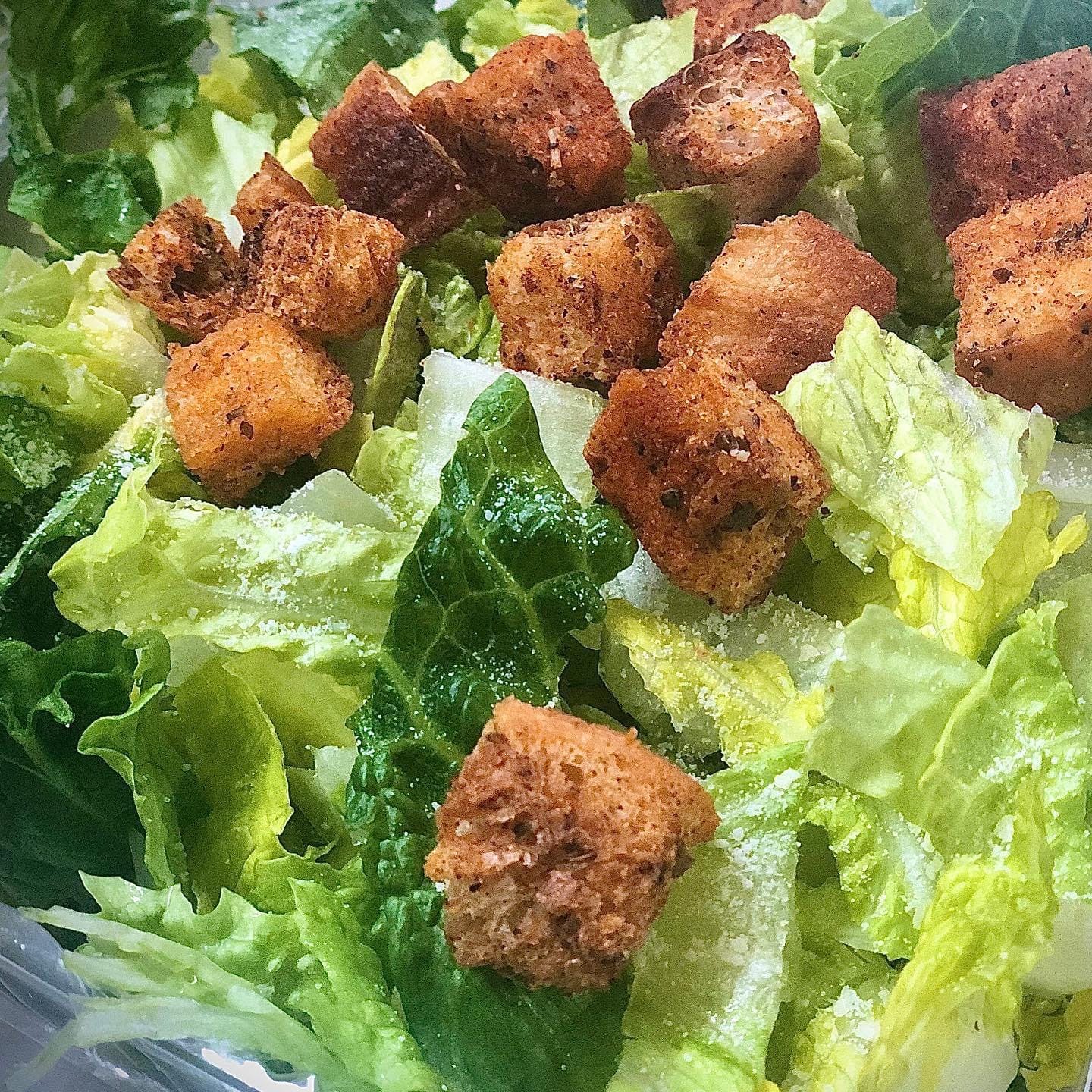 Order Caesar Salad - Salad food online from Kelley Square Pizza store, Worcester on bringmethat.com