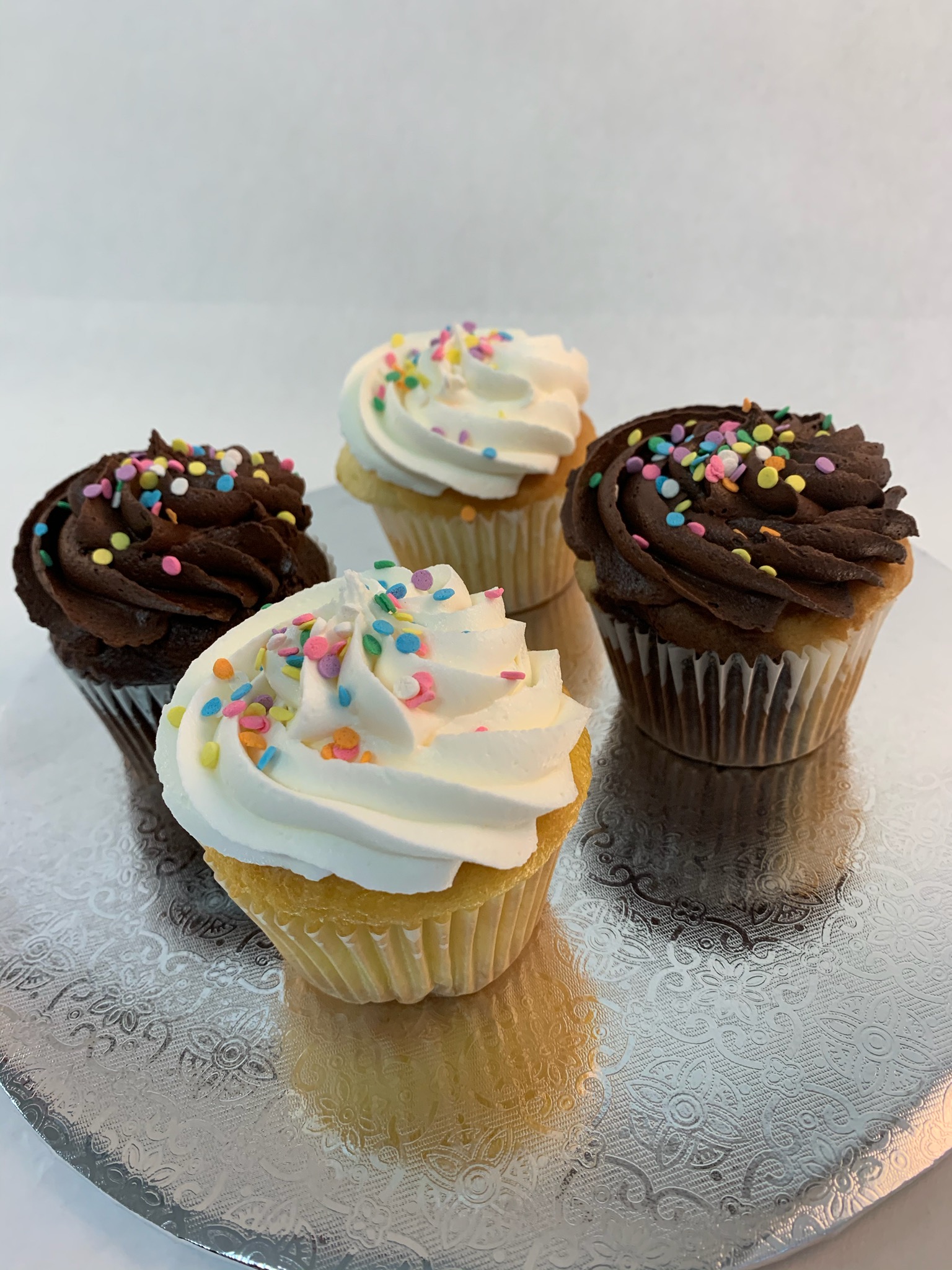 Order 4 Cupcakes food online from Creative Cakes store, Silver Spring on bringmethat.com