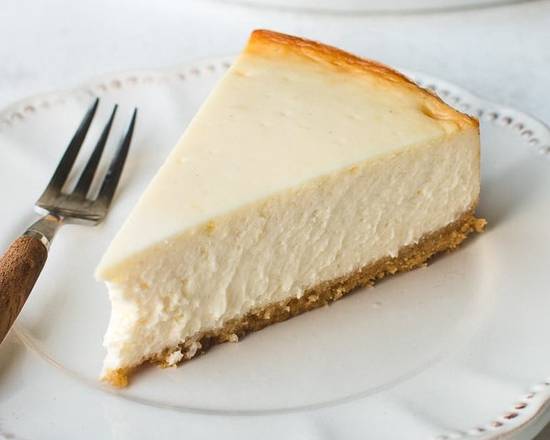 Order Cheesecake (per piece) food online from Mangos Cafe store, Columbus on bringmethat.com