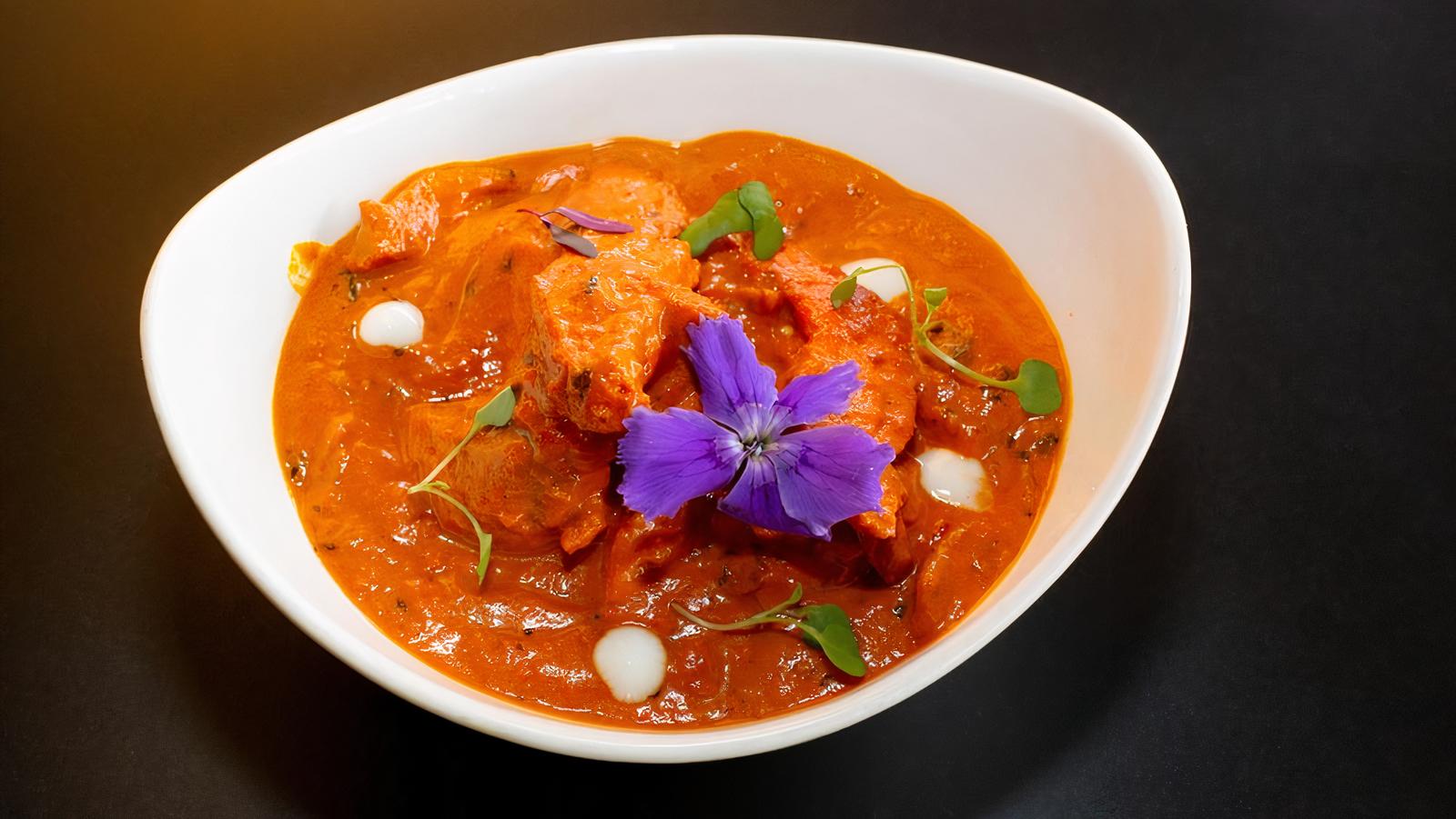 Order Butter Chicken Curry food online from Masala Desi Cafe store, Burlingame on bringmethat.com