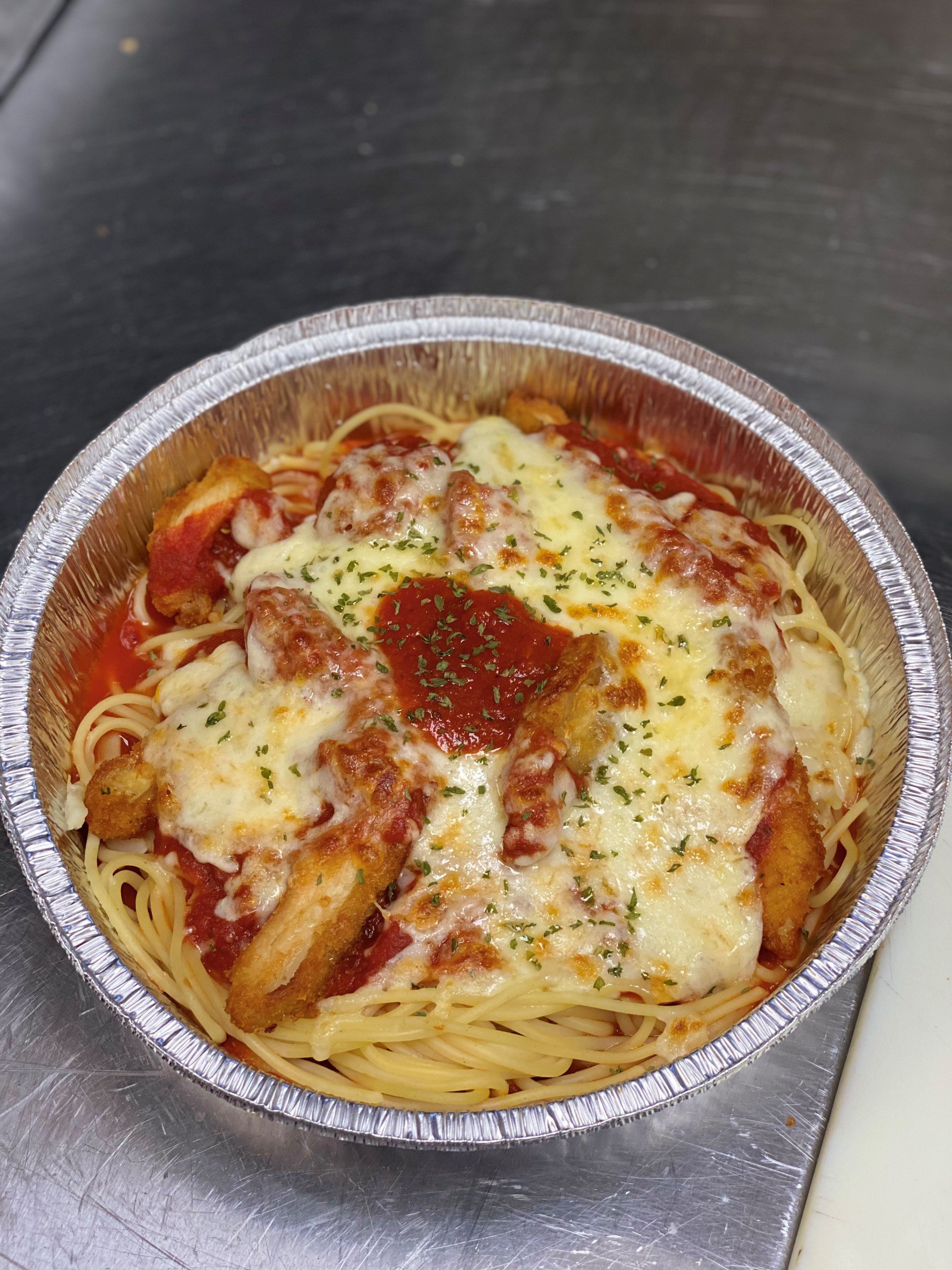 Order Chicken Parmesan Over Spaghetti food online from Three Brothers Italian Restaurant store, Waldorf on bringmethat.com