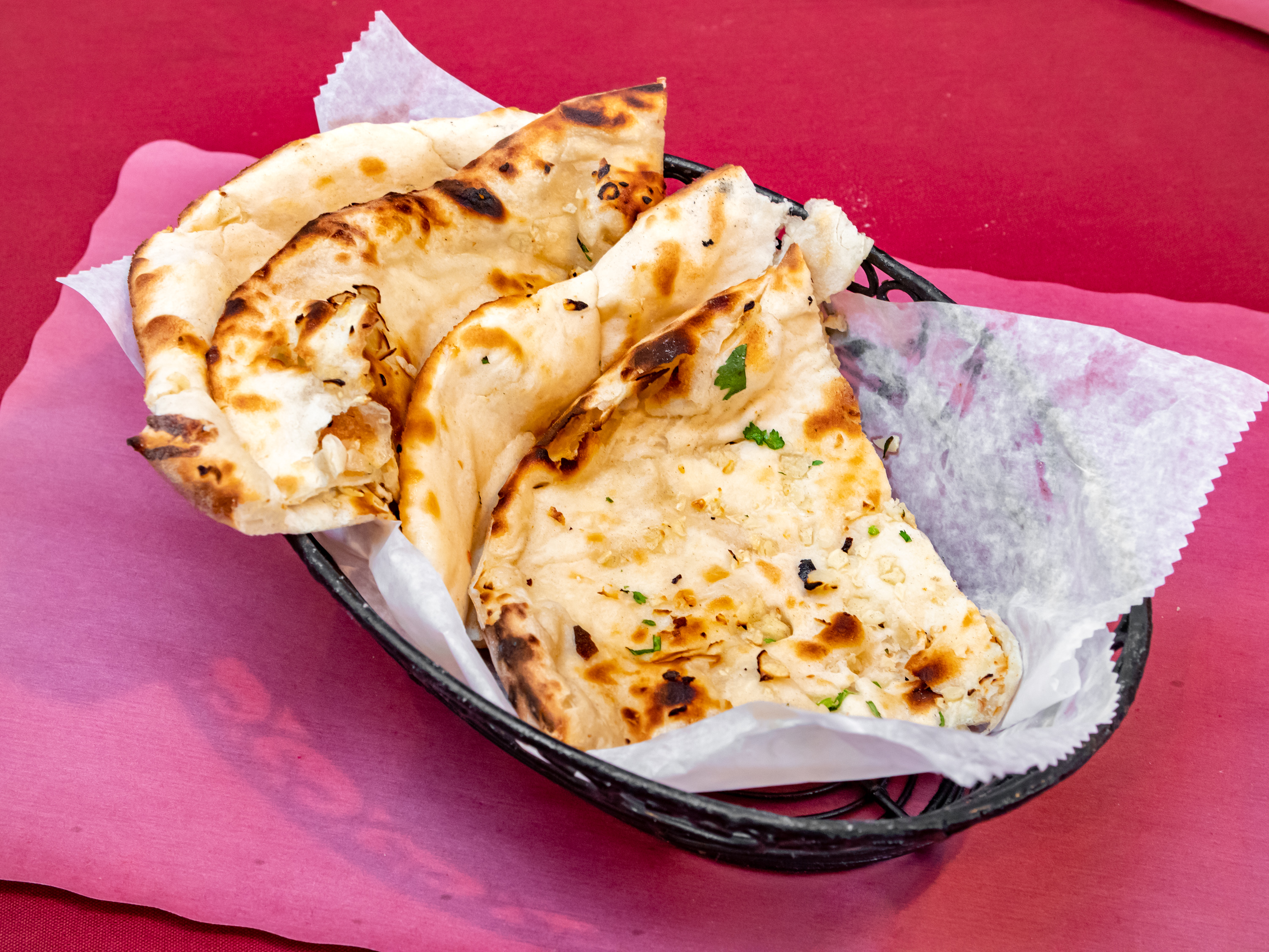 Order Garlic Naan food online from Caffe India store, Morristown on bringmethat.com